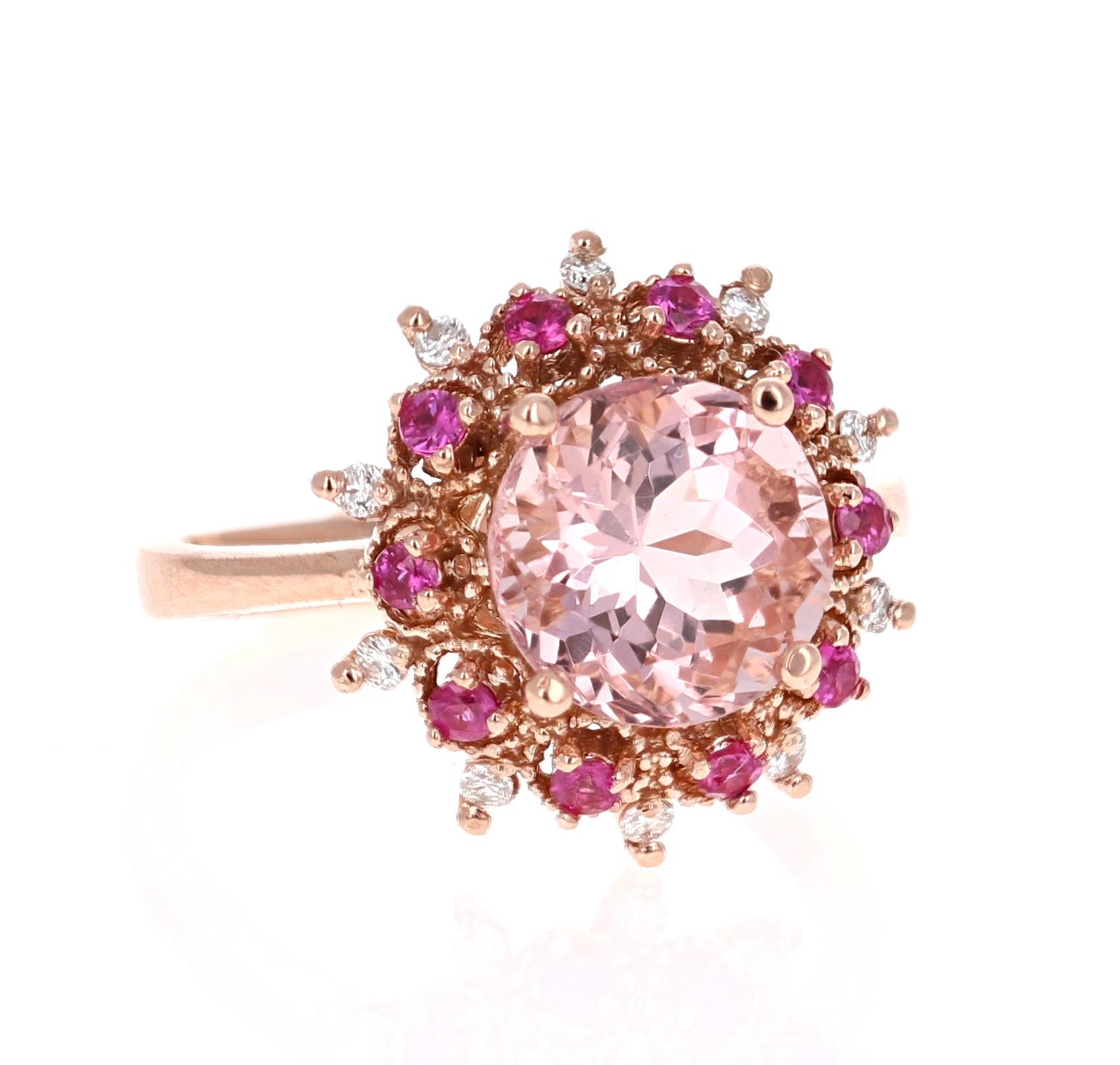 A lovely Engagement Ring Option or as an alternate to a Pink Diamond Cocktail Ring! 

This gorgeous Morganite and Diamond Ring has a 2.75 Carat Round Cut Pink Morganite and is surrounded by alternating Pink Sapphires that weigh 0.37 carats and 10