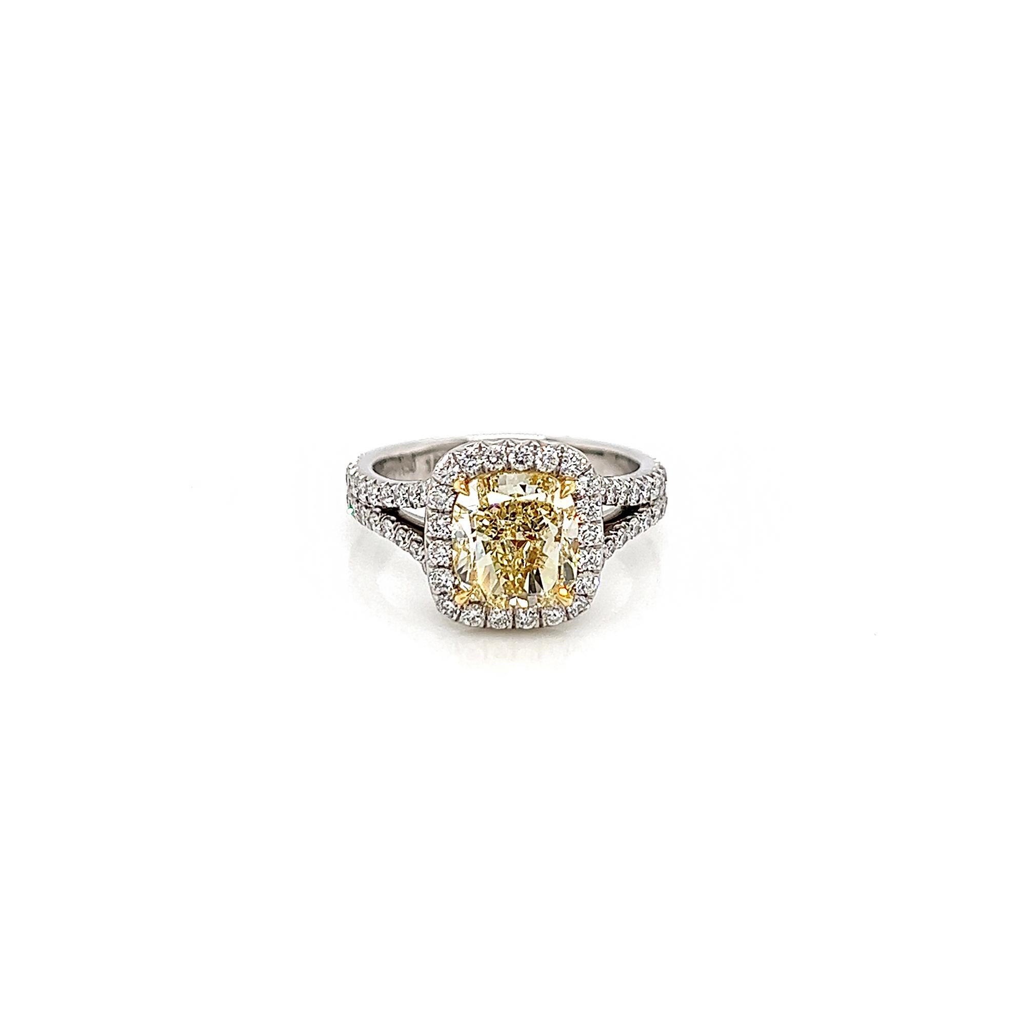 3.24 Total Carat Fancy Yellow Diamond Ladies Halo Pave-Set Engagement Ring. GIA Certified.

Beautiful summer vacation can be defined in a lot of ways: drinks with umbrellas on a sunny beach in Florida come to mind. But if we were to express it