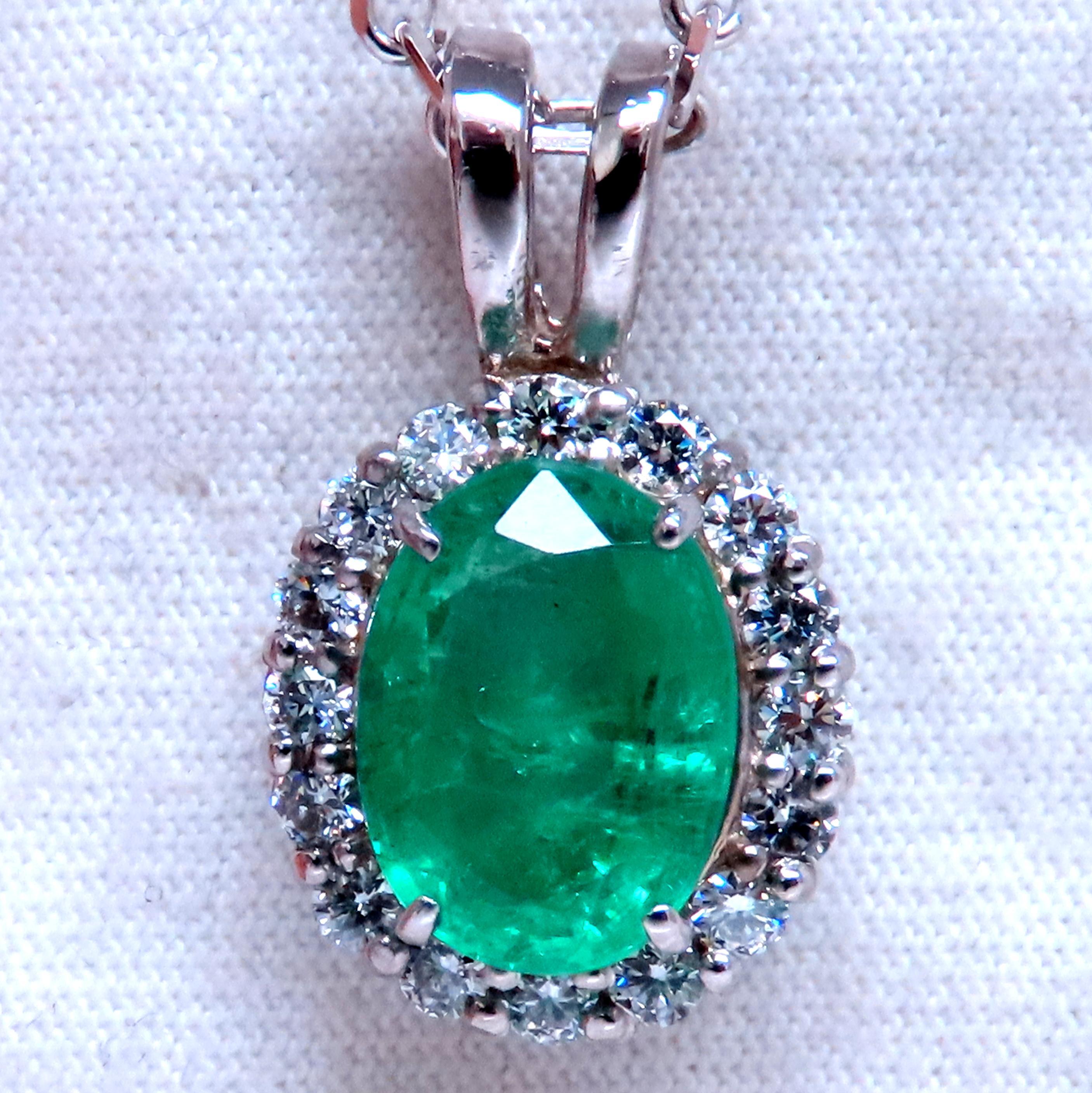 Natural Emerald Diamond Necklace

3.24ct Natural Oval Emerald
11 x 8 mm
Clean Clarity & Transparent

.70ct Natural Diamonds.
Rounds G-color Vs-2 clarity.

14kt white gold.
20 inches long
21 x 13mm
9.8 grams