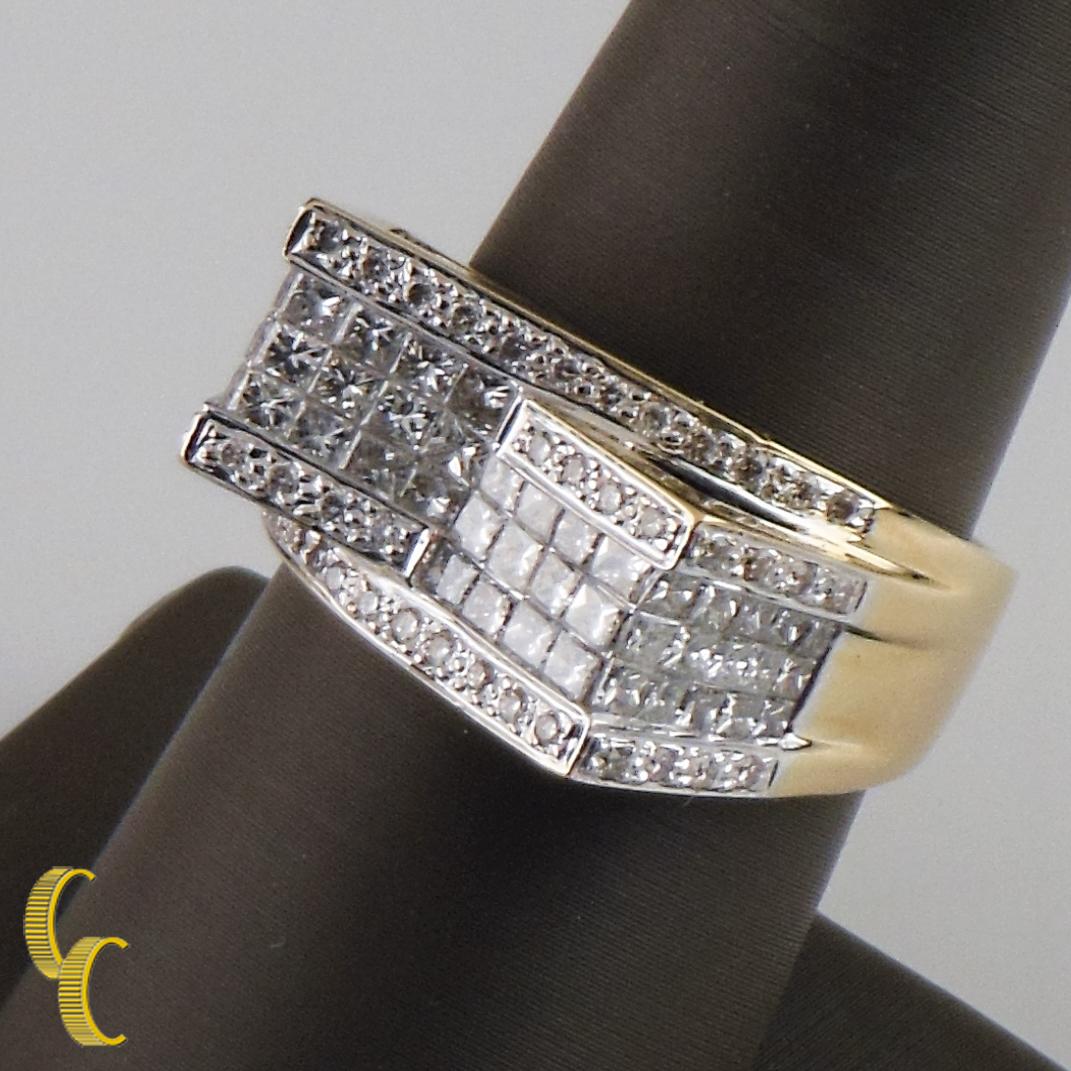 Gorgeous 14k Yellow Gold Unique Plaque Ring w/ Princess-Cut Invisible Set Intersecting Jagged Plaques and Round Brilliant Bead-Set Diamond Borders
Ring size - 9
Carat total weight - 3.25 Ct
Color - H-I
Clarity - VS-SI
Total mass - 11.8 g
Stones are