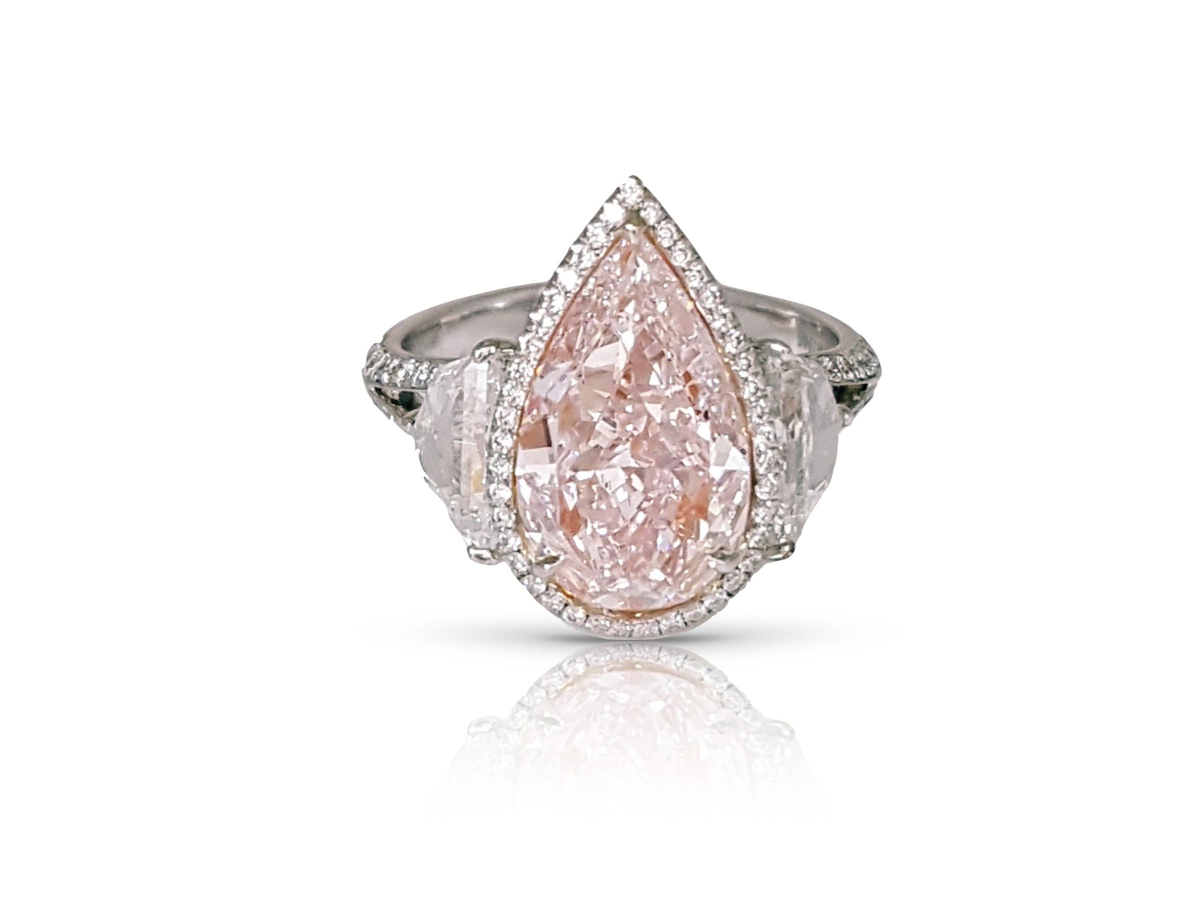 pale pink diamond engagement ring