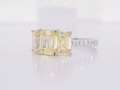 3.25 Carat Fancy Yellow Emerald-Cut Diamond Three-Stone Ring Platinum & 18K Gold