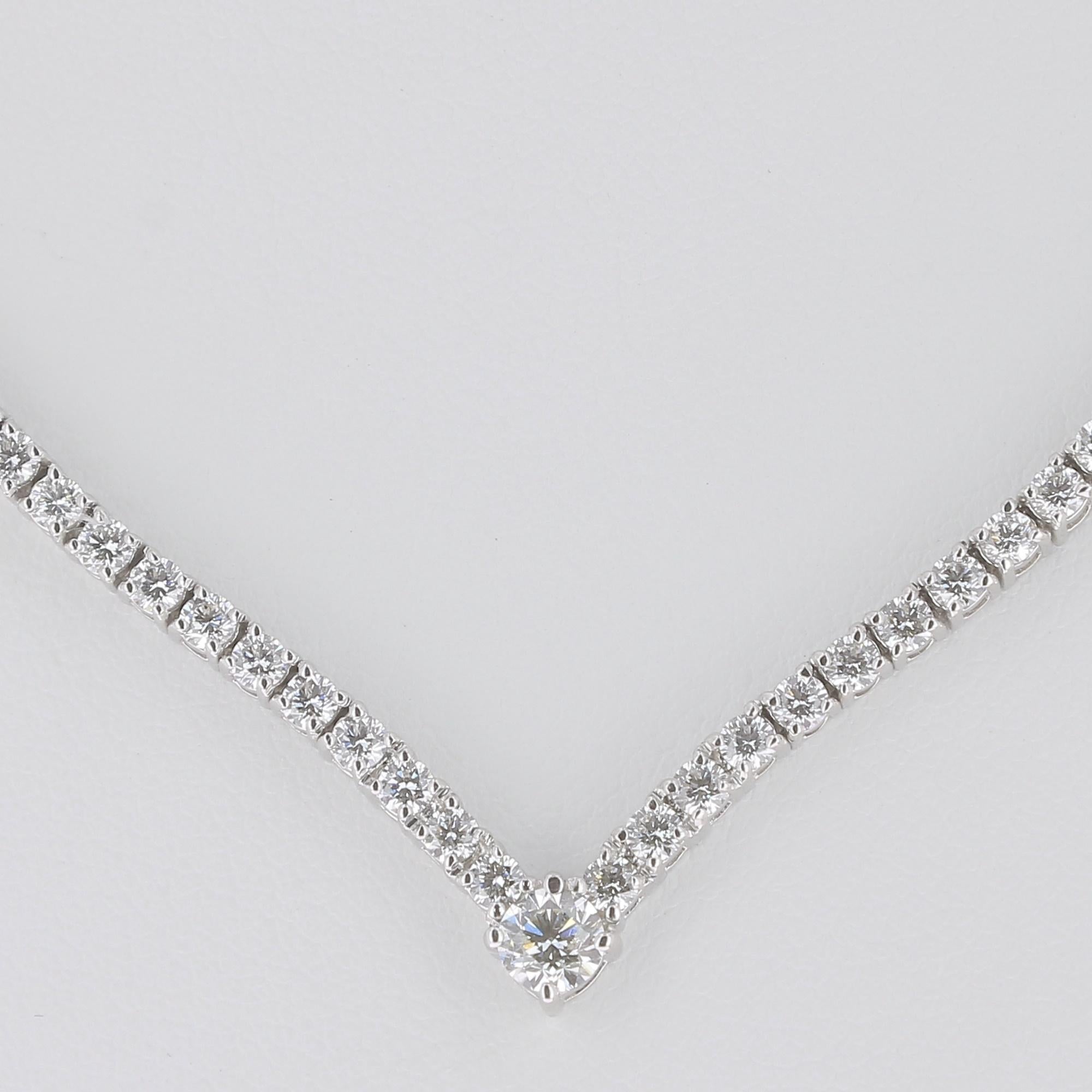 A unique Drop Diamond Necklaces set with 92 Brilliant Round Diamonds and 1 Round Diamond. 
The diamond weight of the necklace is 3.25 Carats.
The Necklace weight is 16.00 Grams.
The Tennis Necklace is set in 18K White Gold, each diamond Color is