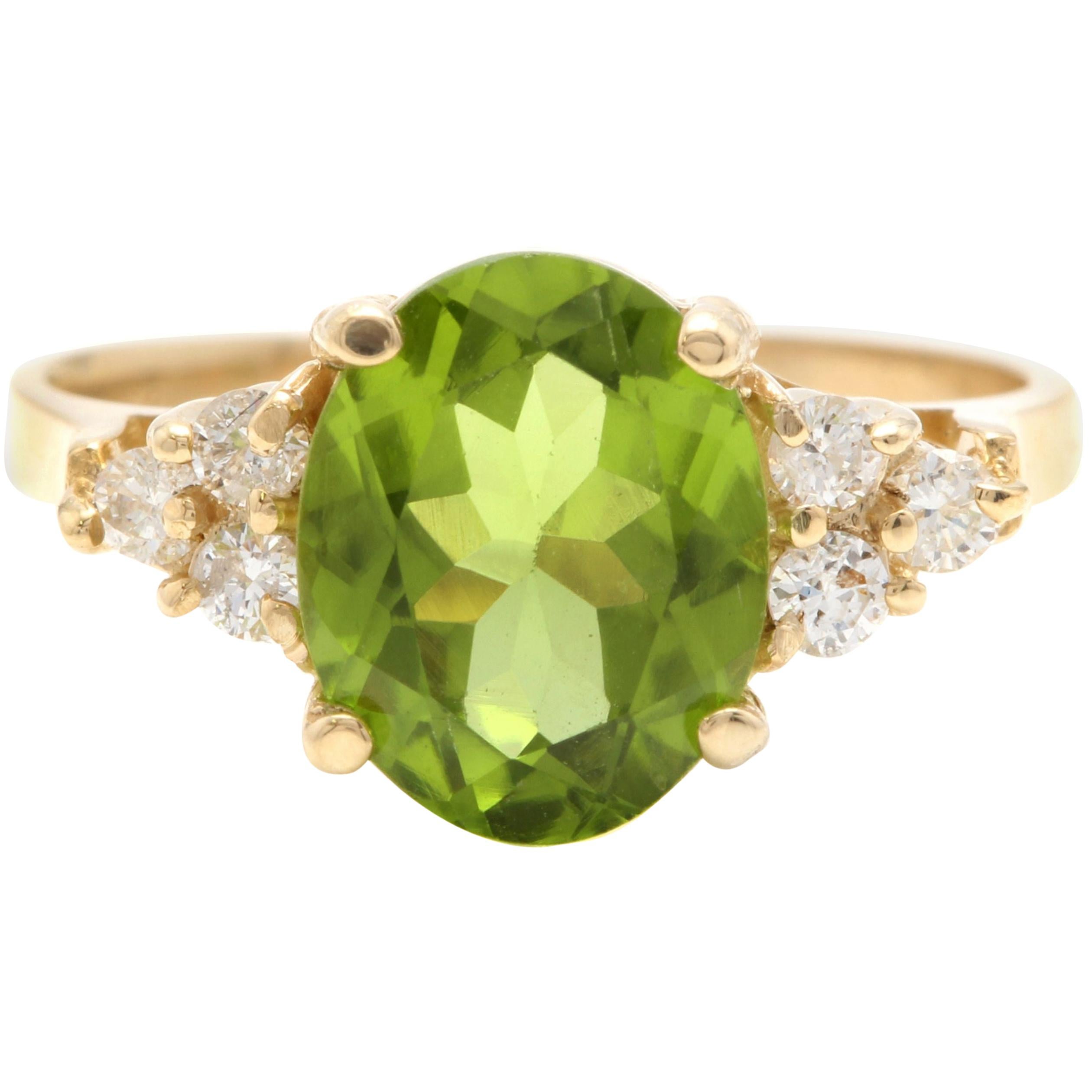 14k Gold Oval Green Peridot and Diamond Fashion Cocktail Anniversary Ring ctw 5 x 3 MM 0.19 Carat