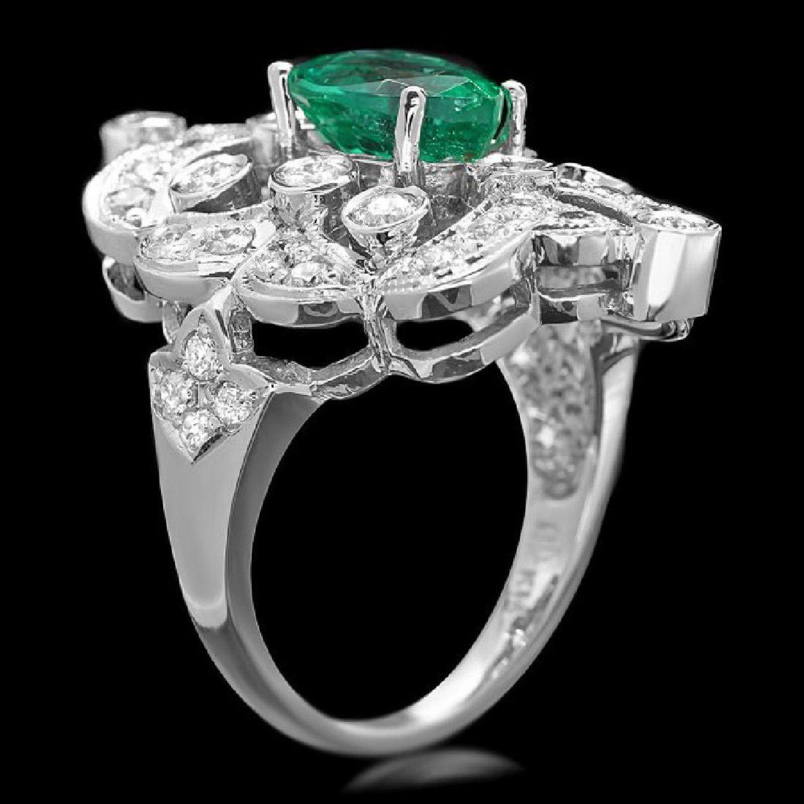 3.25 Carats Natural Emerald and Diamond 14K Solid White Gold Ring

Total Natural Green Emerald Weight is: Approx. 2.00 Carats (transparent)

Emerald Measures: Approx. 9.00 x 7.00mm

Emerald Treatment: Oiling

Natural Round Diamonds Weight: Approx.