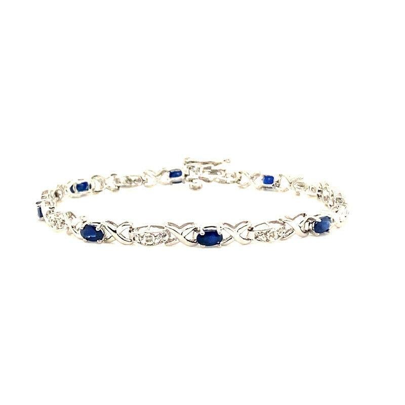 
100% Natural Diamonds and Sapphires 
3.25 CTW (Diamonds - 0.05CT, Sapphires - 3.20CT)
Dia Color: G-H 
Dia Clarity: SI  
14K White Gold, prong style
7 inches in length

B5965WS
ALL OUR ITEMS ARE AVAILABLE TO BE ORDERED IN 14K WHITE, ROSE OR YELLOW