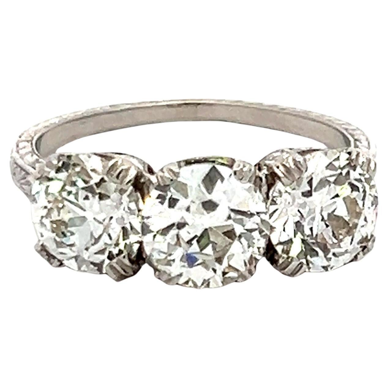 3.25 Carat Old European Cut J VS1-VS2 Diamond Platinum Three-Stone Ring