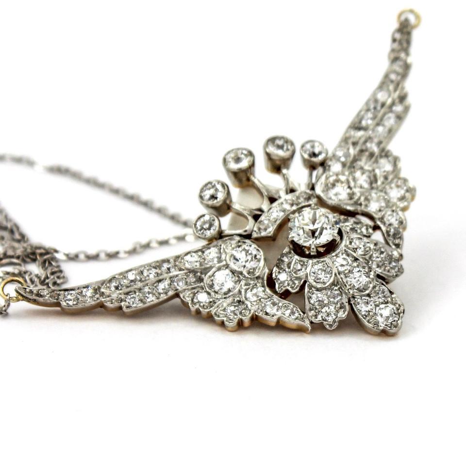 3.25 Carat Platinum 18k Gold Diamond Art Deco Crown with Wings Pendant Necklace For Sale 1