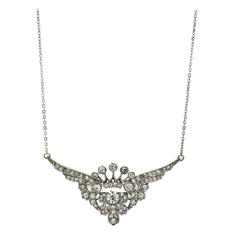3.25 Carat Platinum 18k Gold Diamond Art Deco Crown with Wings Pendant Necklace For Sale