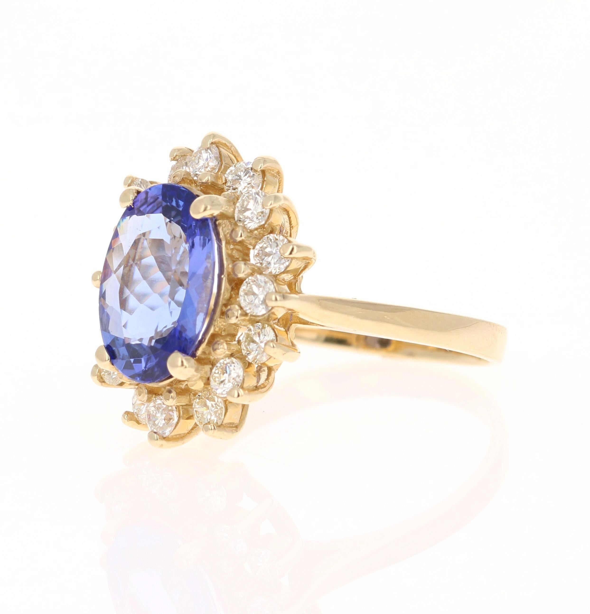 Contemporary 3.25 Carat Tanzanite Diamond 14 Karat Yellow Gold Engagement Ring For Sale