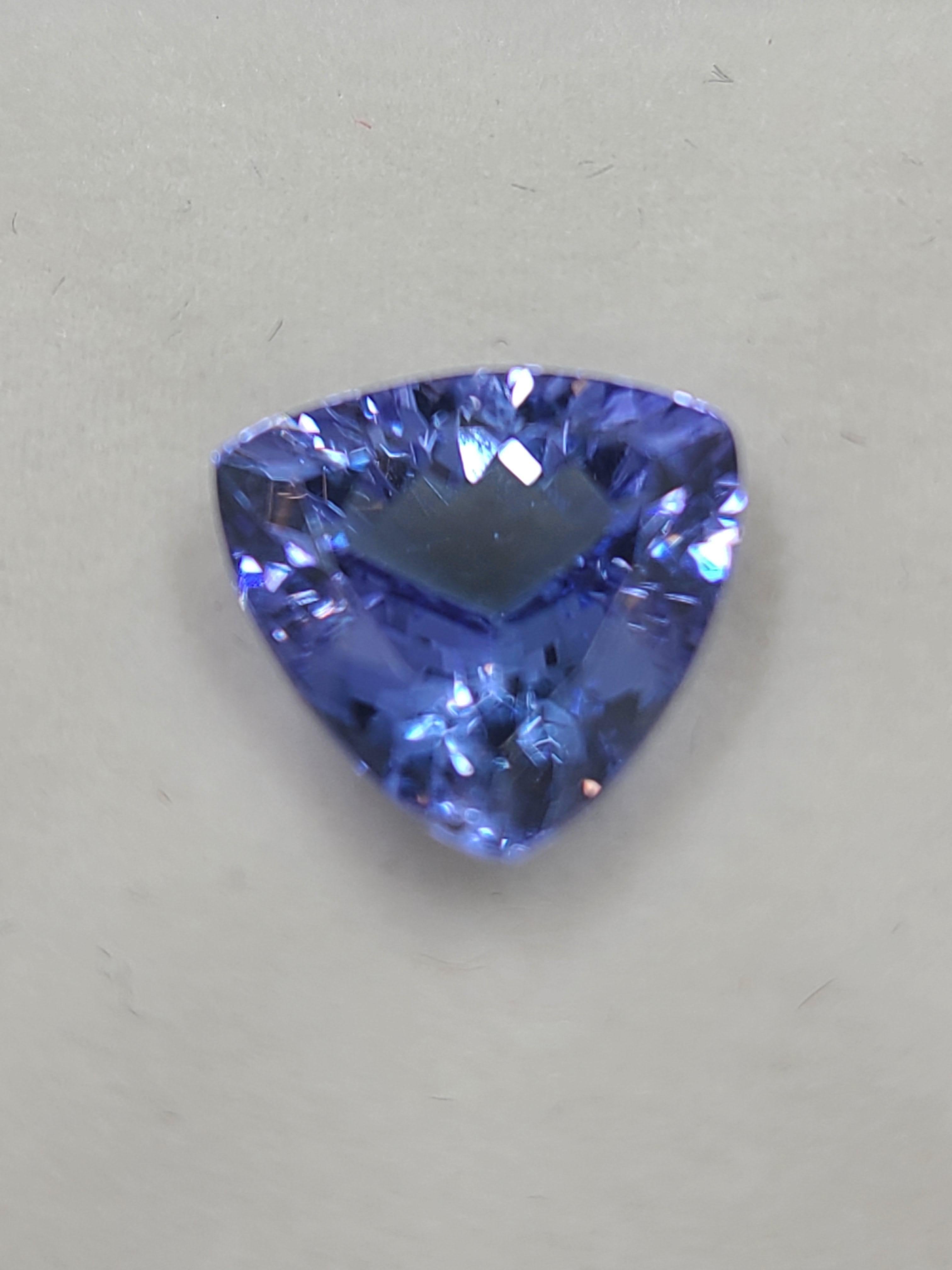 3.25 Carat Tanzanite Flawless 10mmx10mm Trillion Cut - Single Loose Stone 
This high-quality natural tanzanite exhibits excellent saturation with a gorgeous deep bluish-purple color, stunningly vibrant with its distinctive hue. 

This single loose