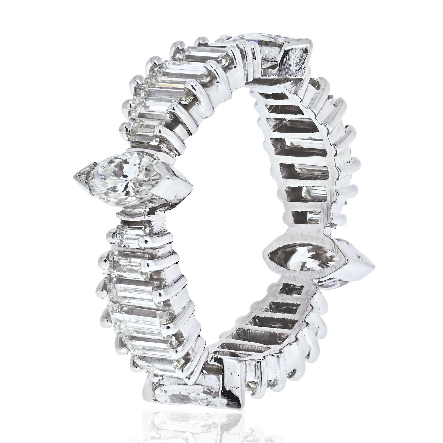 Own this fun vintage platinum diamond eternity band from 1950's. It is set with 3.25cts of vintage cut baguette and marquise cut diamonds. It can be worn as a wedding band, eternity ring or just a fun index finger band. You decide! 
One thing we
