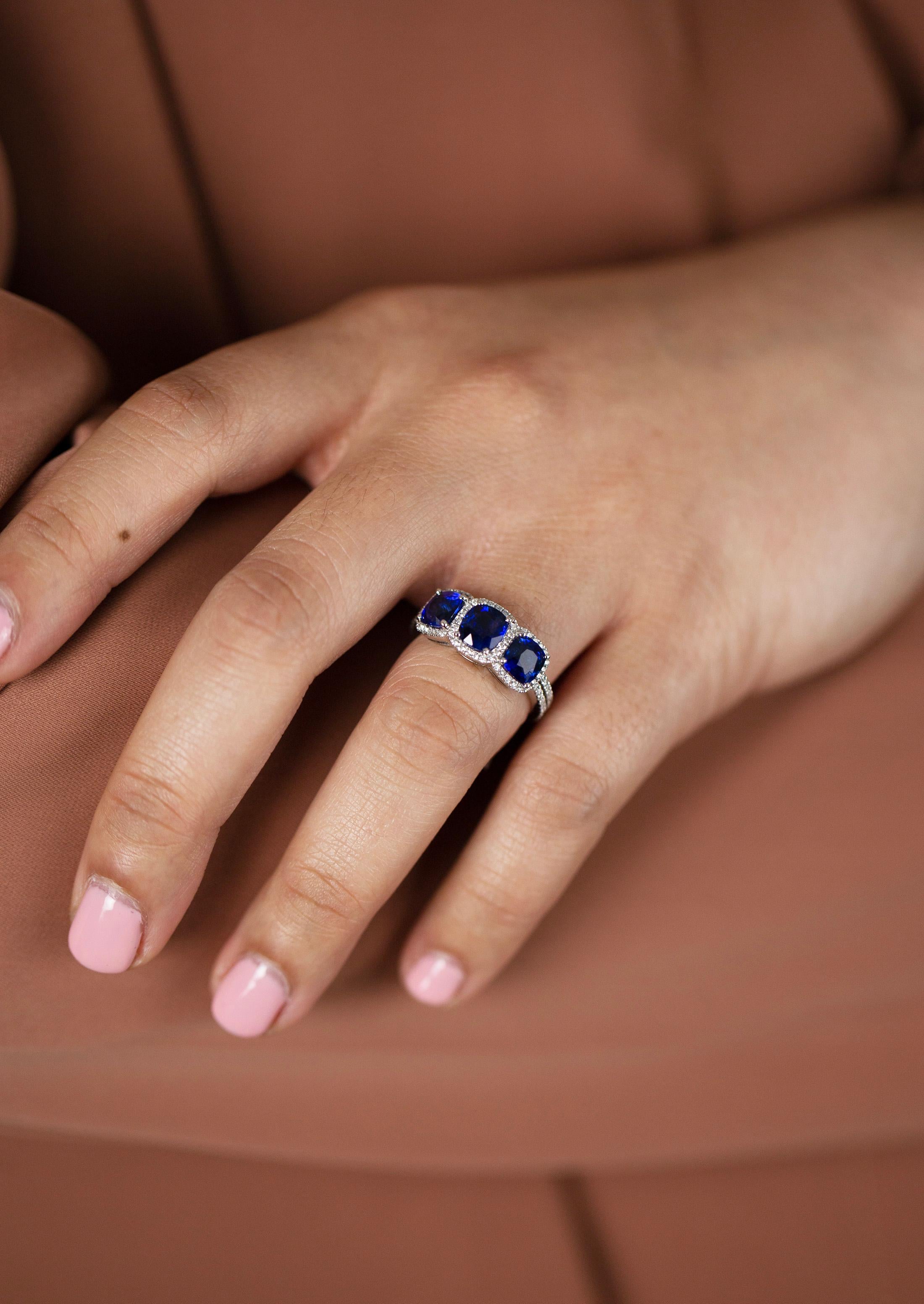 3.25 Carats Cushion Cut Blue Sapphire & Diamond Three Stone Halo Engagement Ring In New Condition For Sale In New York, NY