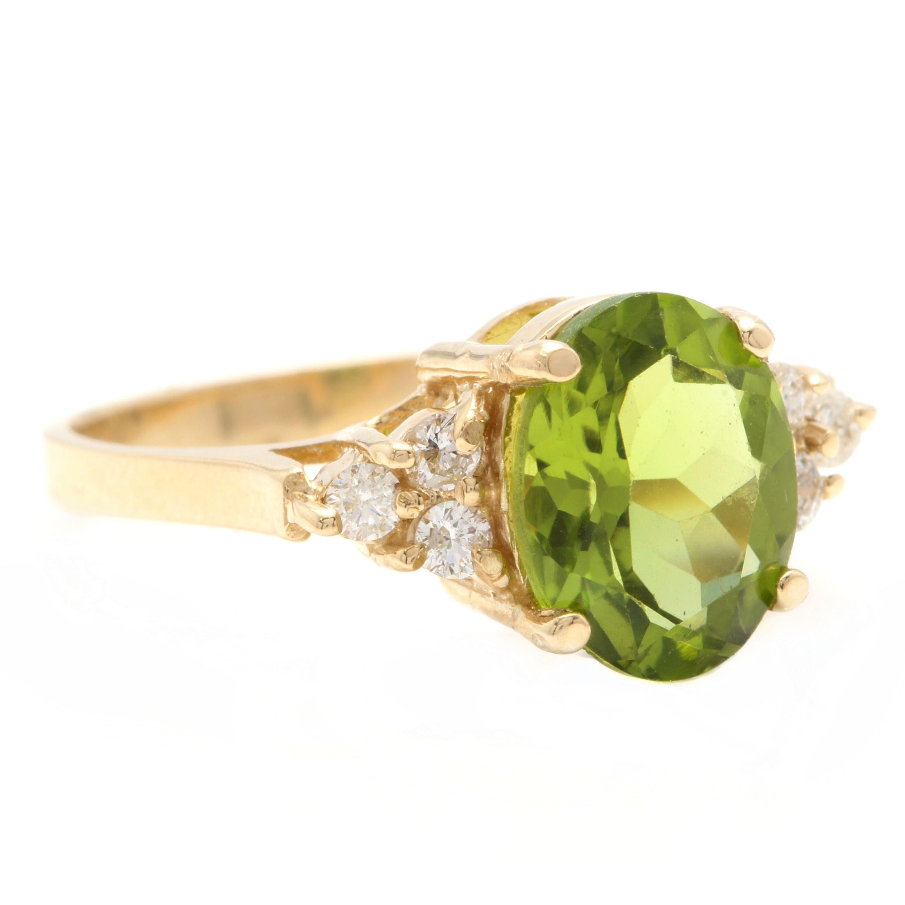 3.25 Carats Impressive Natural Peridot and Diamond 14K Yellow Gold Ring

Total Natural Peridot Weight is: Approx. 3.00 Carats

Peridot Measures: Approx. 10.00 x 8.00mm

Natural Round Diamonds Weight: Approx. 0.25 Carats (color G-H / Clarity
