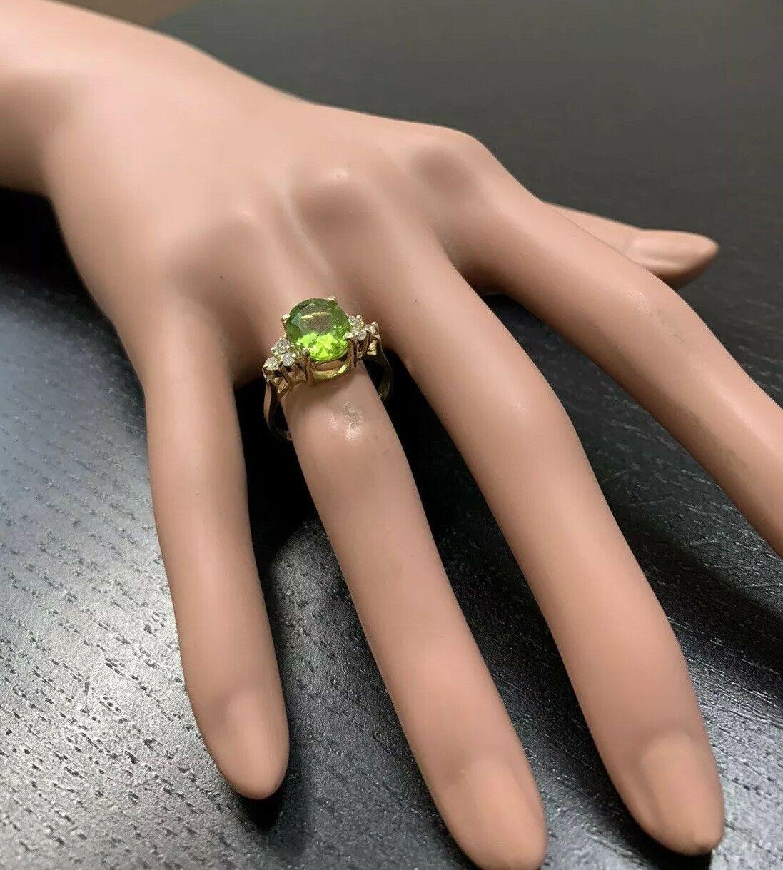 3.25 Carat Impressive Natural Peridot and Diamond 14 Karat Yellow Gold Ring In New Condition For Sale In Los Angeles, CA