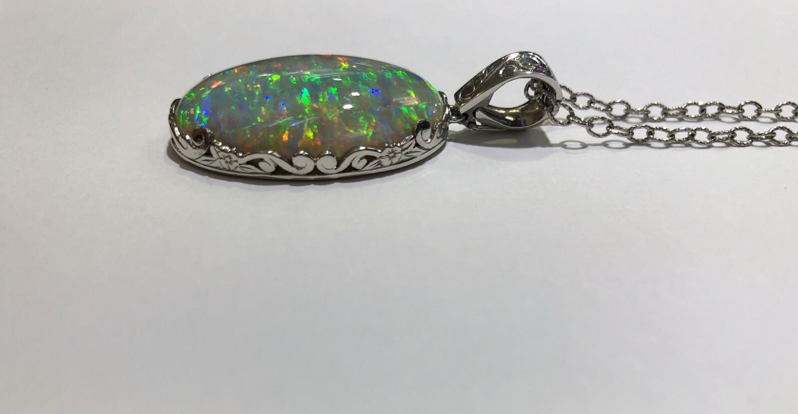 32.58 Carat Oval Opal ‘GIA’ Set on a Platinum Pendant In Excellent Condition In Houston, TX