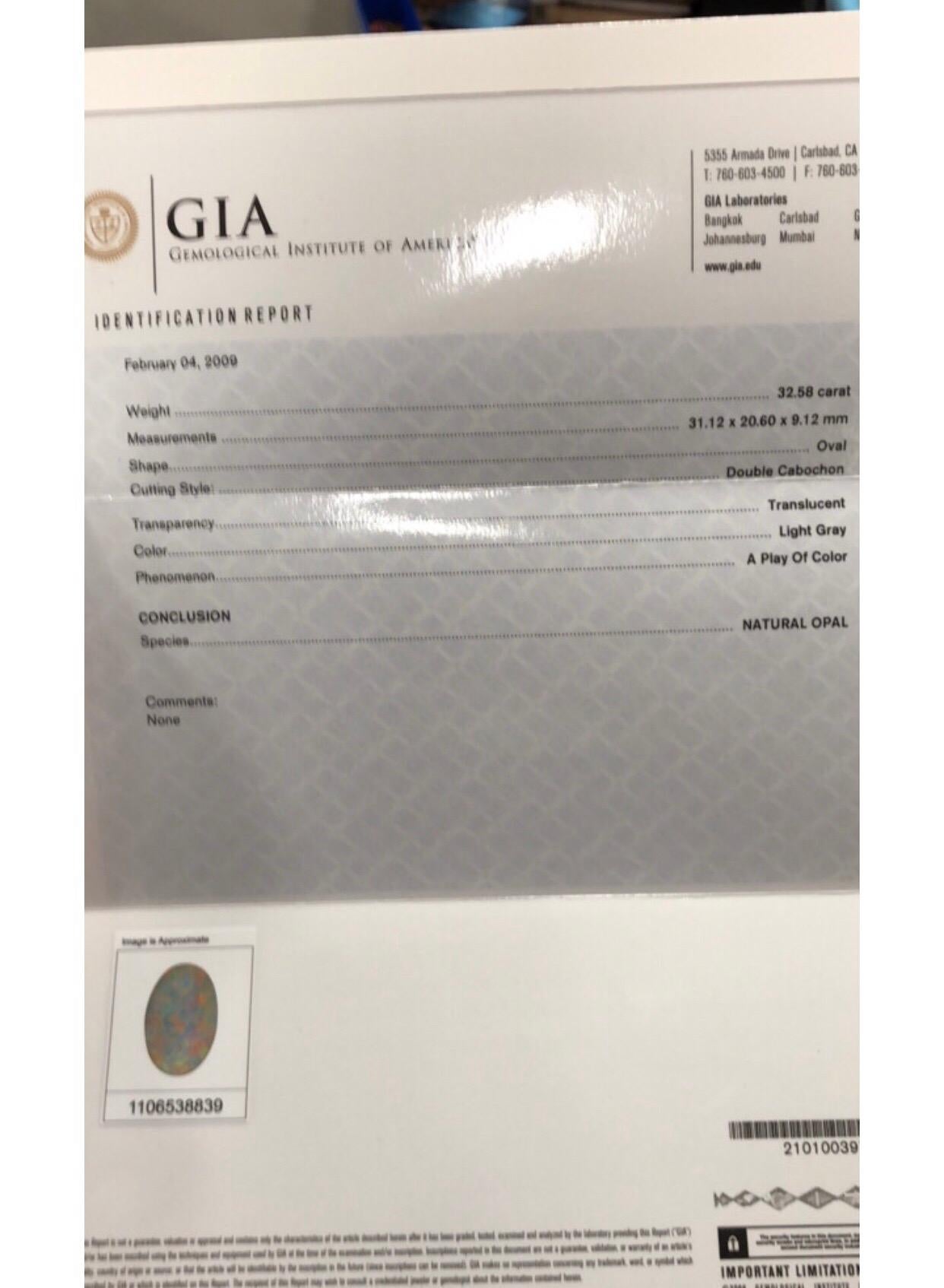 32.58 Carat Oval Opal ‘GIA’ Set on a Platinum Pendant 1