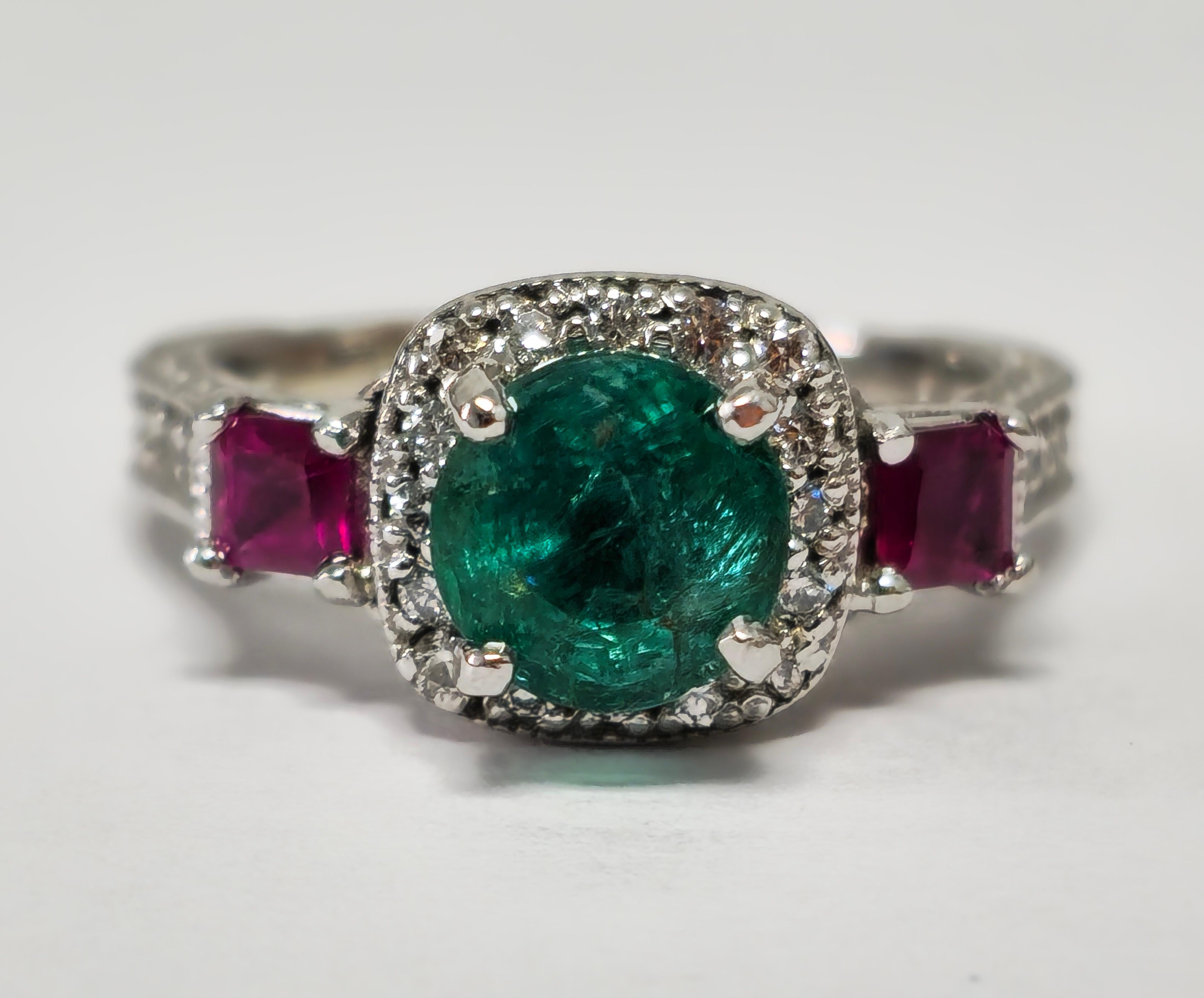 Step into sophistication with our stunning Women's Cocktail Ring, meticulously crafted from luxurious white gold. Adorned with a mesmerizing Colombian emerald and accentuated by princess cut rubies and diamonds, this ring exudes opulence and