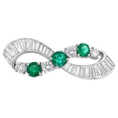 3.25ctw Prong Set & Channel Set Baguette Diamonds with 1.45ctw Emeralds Pin