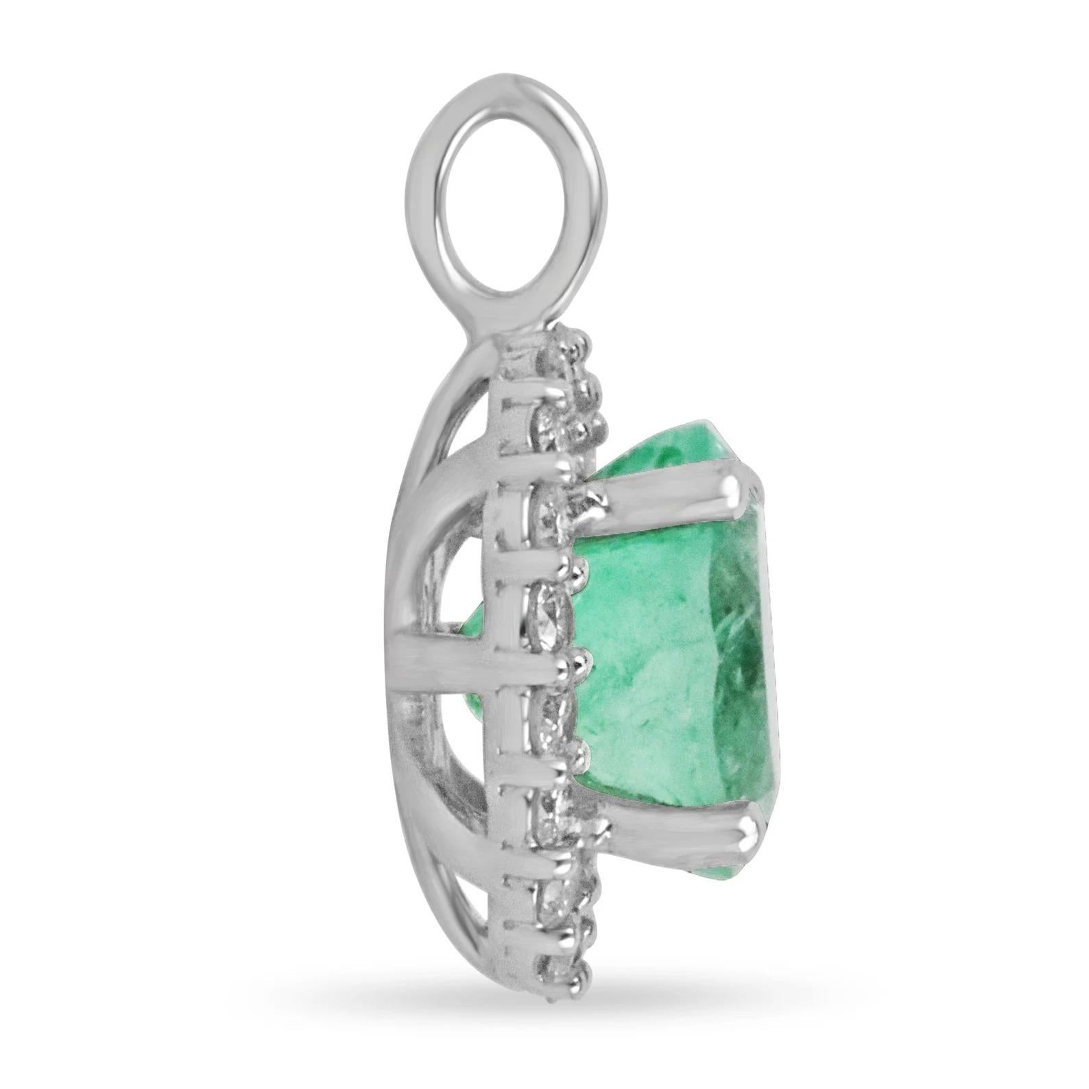 A vivacious 3.03tcw emerald and diamond halo pendant. Crafted in the gold of your choice, this piece is sure to make a debut. The center gemstone is an earth-mined emerald that is handset in a secure four-prong setting. This gem has excellent luster