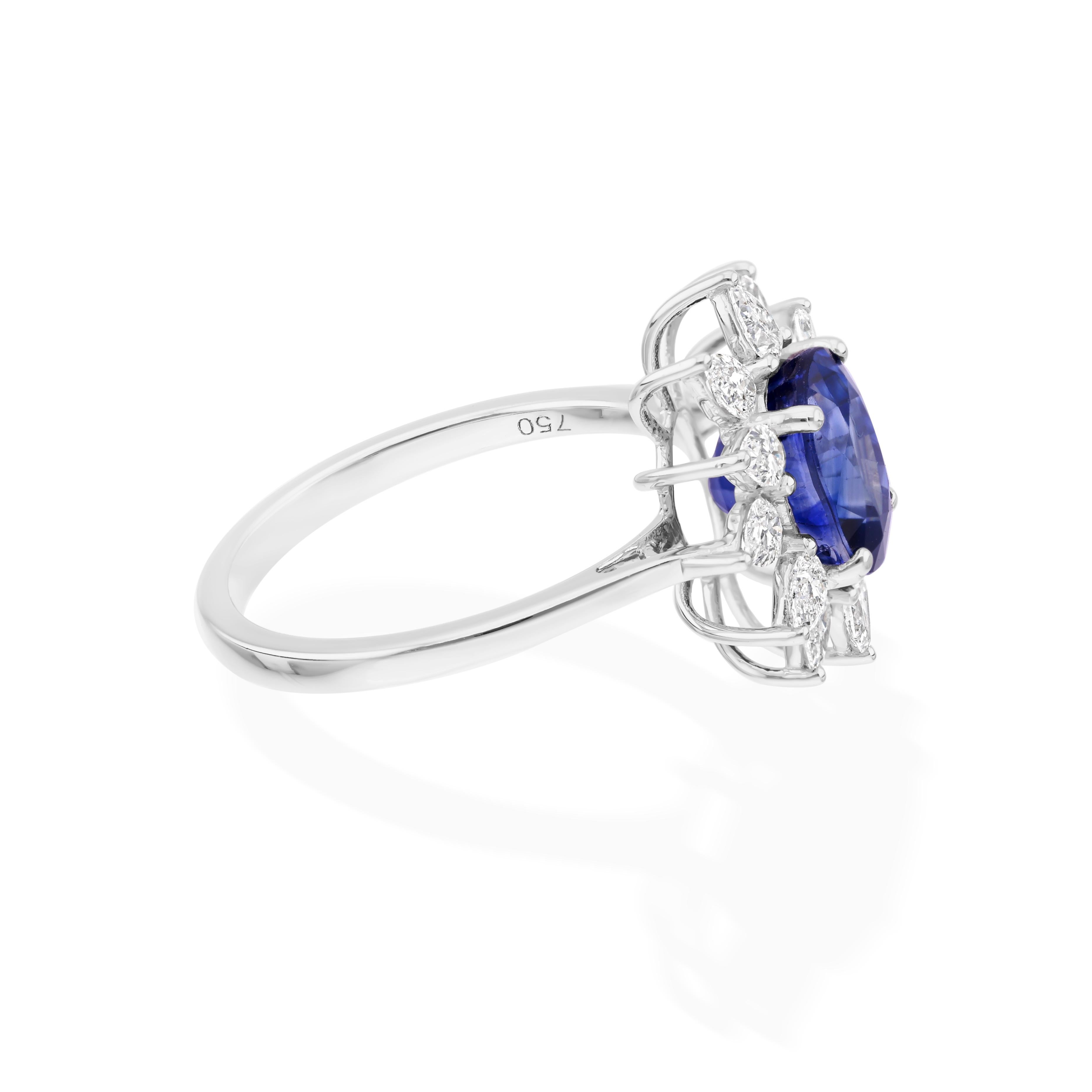 Cast from 18-karat gold, these exquisite ring is handset with 3.26 carats blue sapphire and 0.75 carats of sparkling diamonds.

The ring is a size 7 and may be resized to larger or smaller upon request. FOLLOW SPECTRUM JEWELS storefront to view the