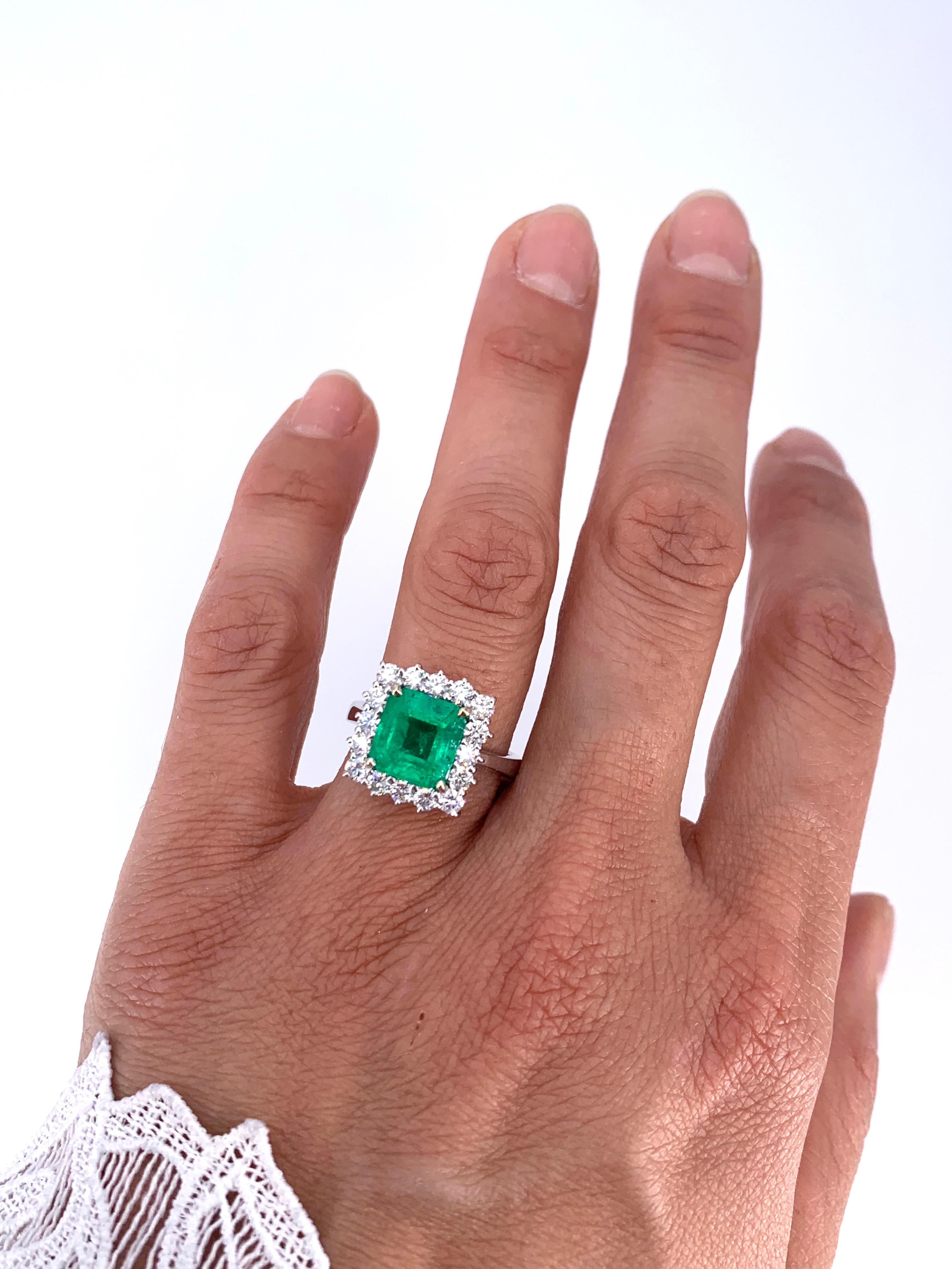 Women's 3.26 Carat Colombian Emerald and 1.02 Carat 18 Kt White Gold Halo Diamond Ring 