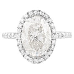 3,26 Karat Ovaler Diamant mit Halo-Ring aus 14 Karat Weigold