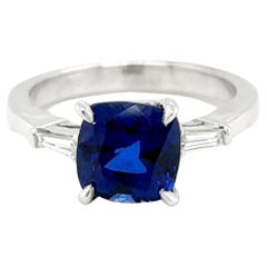 3.26 Carats Cushion Blue Sapphire Chatham Engagement Ring with Tapered Baguettes