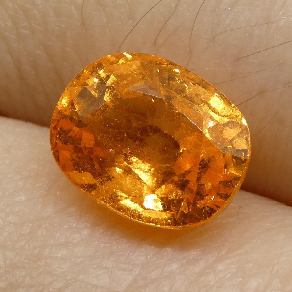 Description:

Gem Type: Spessartite Garnet
Number of Stones: 1
Weight: 3.26 cts
Measurements: 8.91x7.05x5.11 mm
Shape: Oval
Cutting Style Crown: Modified Brilliant Cut
Cutting Style Pavilion: Step Cut
Transparency: Transparent
Clarity: Moderately