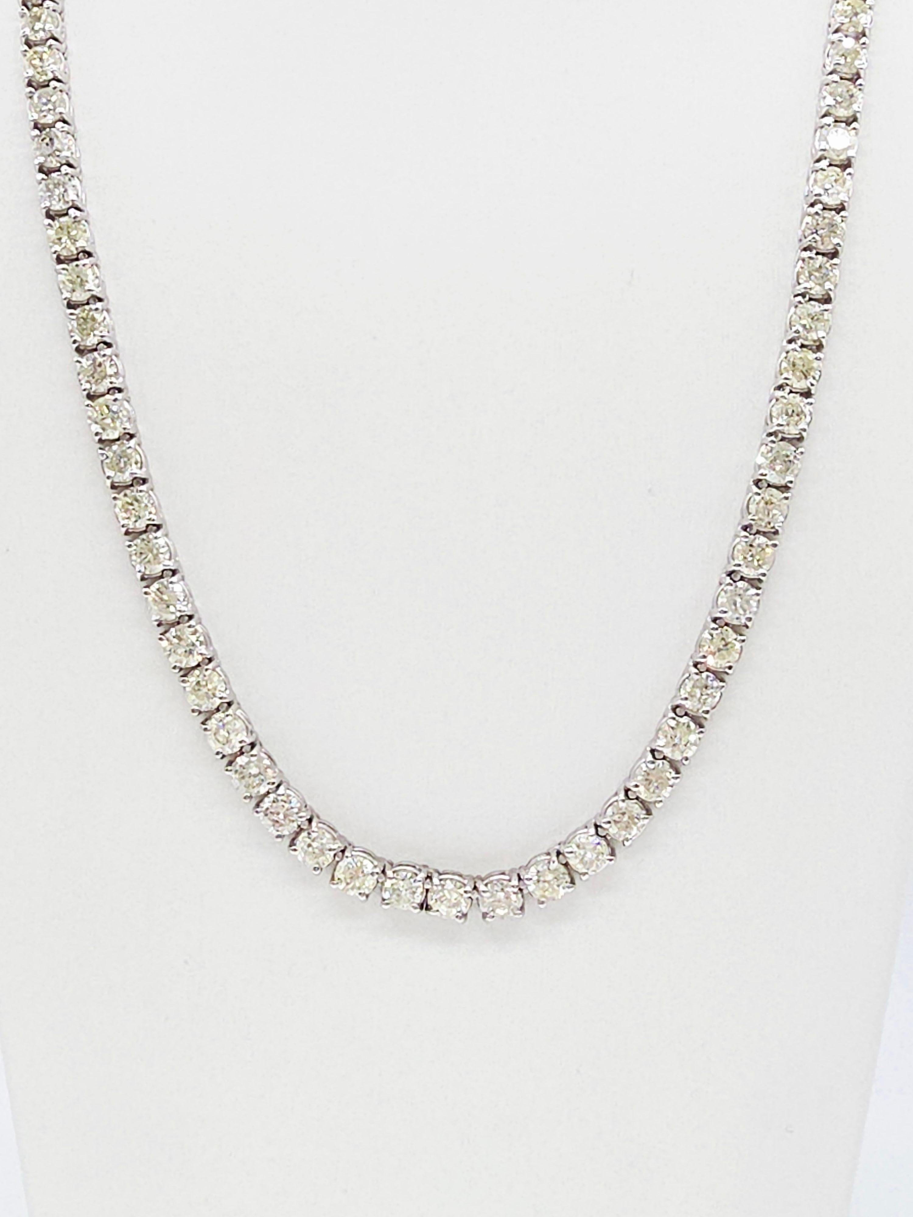 Elegant Tennis Necklace with Round-Brilliant Cut White Diamonds

This luxurious tennis necklace showcases round-brilliant cut white diamonds, renowned for their exceptional sparkle and brilliance. With a classic four-prong setting, the necklace