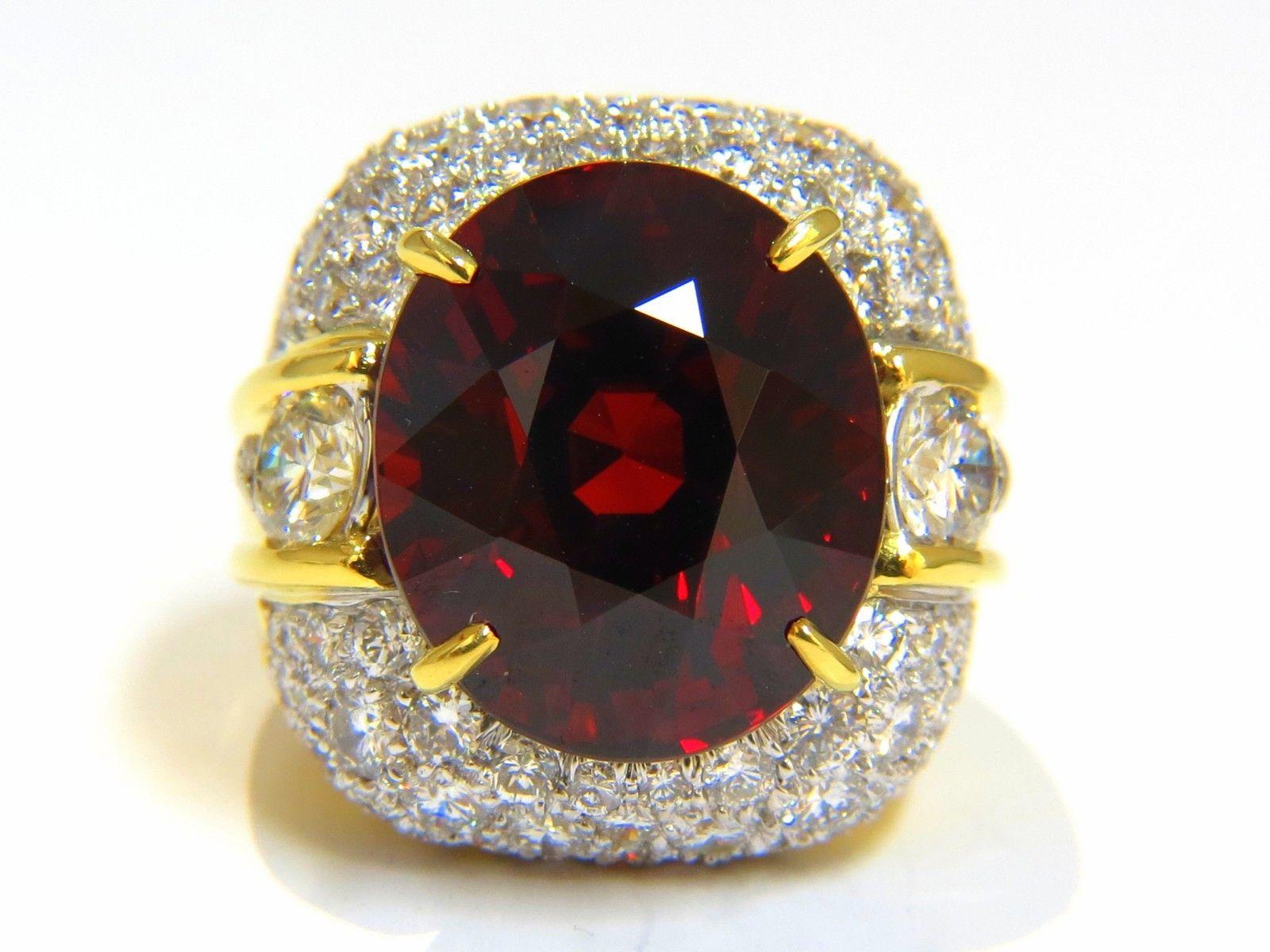 Raised Dome Spessartite 

GIA 28.64ct. Natural Red Spessartite & 4.00ct. diamonds ring.

GIA Certified Report ID: 2105439004

17.14 X 14.58 X 12.84mm

Full cut oval brilliant 

Clean Clarity & Transparent

4.00ct. Diamonds.

Rounds Full cuts