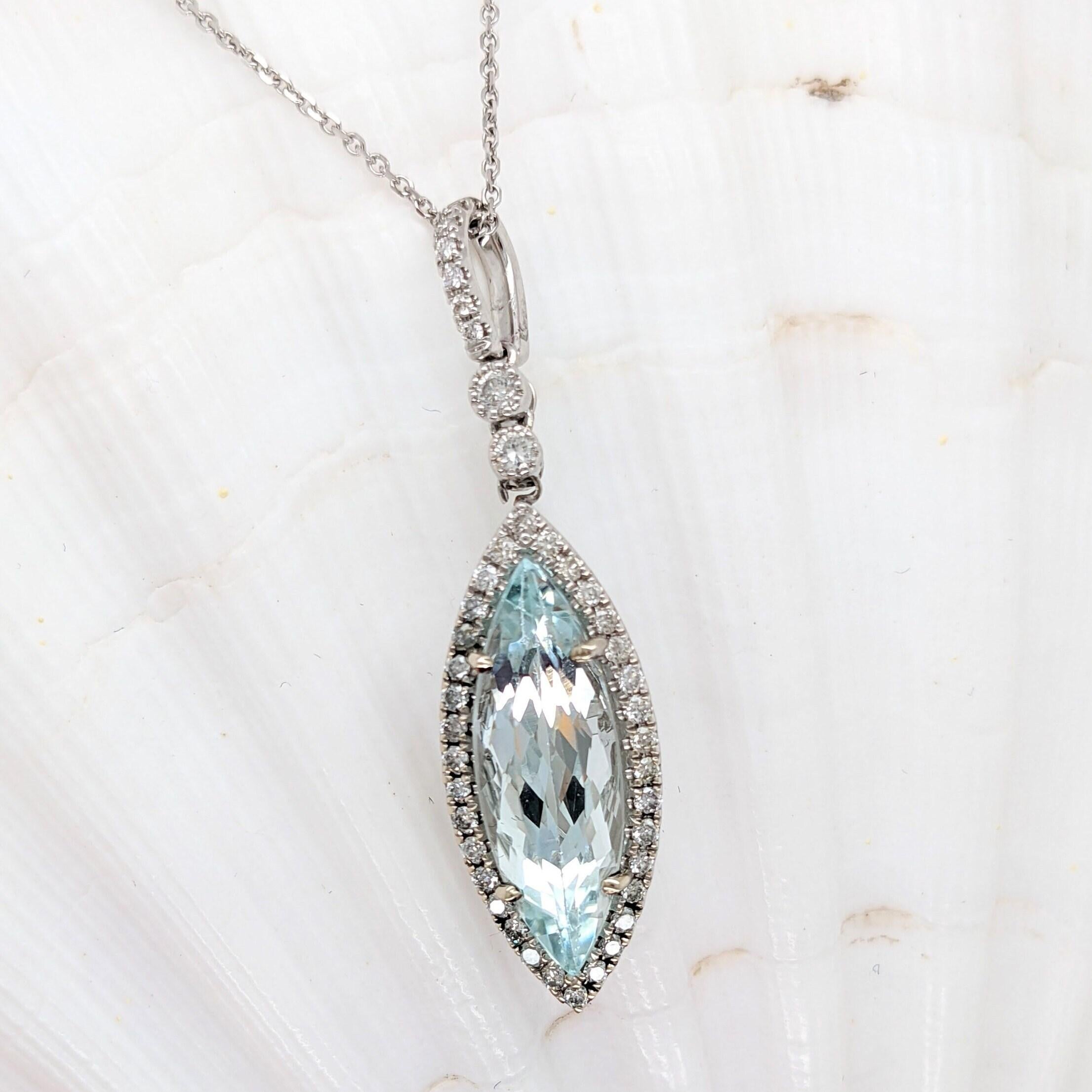 Specifications:

Item Type: Pendant
Gold Purity: 14k
Gold weight: 2.66 grams
Diamond: 42 diamonds totaling 0.36 cts

Stone Specs:
Type: Aquamarine
Weight: 3.26 cts
Shape: Marquise
Size: 19.5x6.5mm
Treatment: Heated
Hardness: 7.5-8

This pendant is