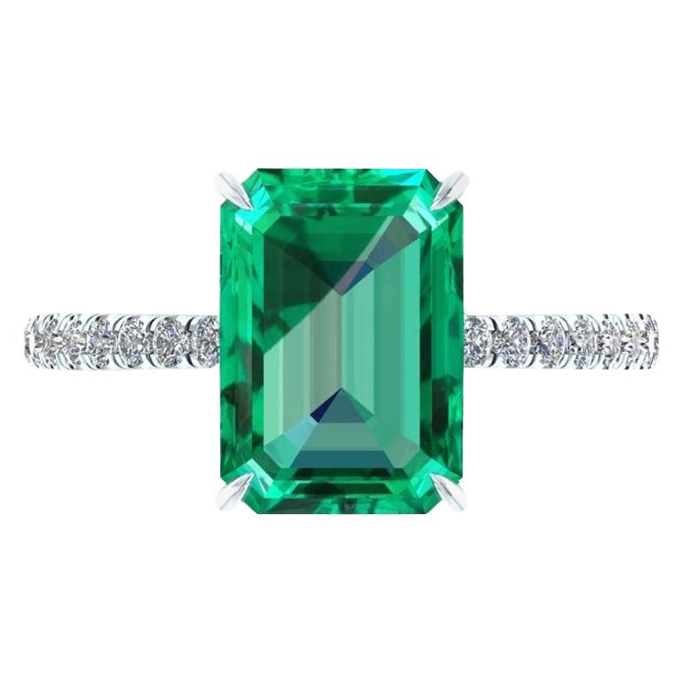  3.27 Carat Colombian Emerald Cut Emerald and Diamond Platinum Ring For Sale