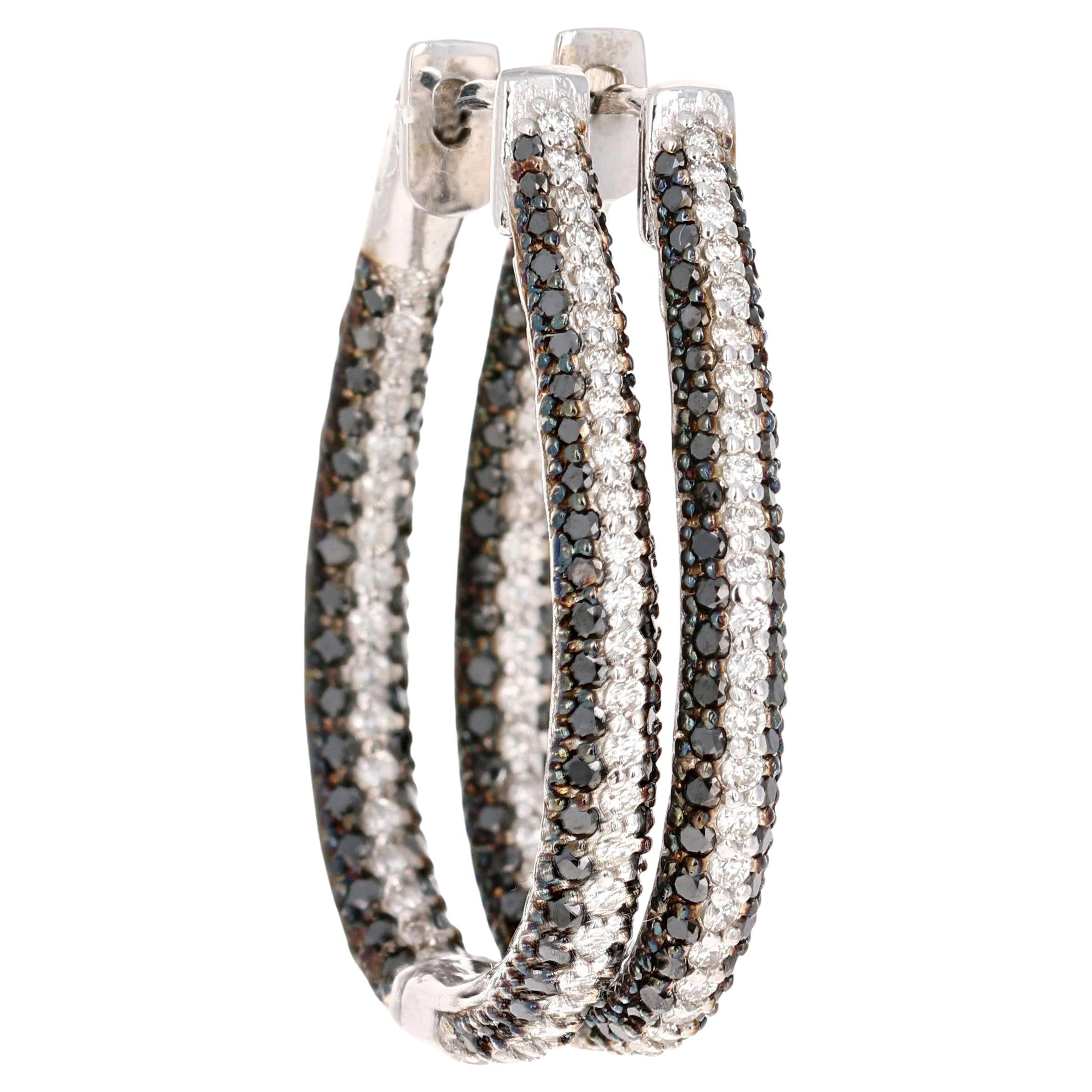 Boucles d
oreilles en or blanc avec diamant noir naturel de 3,27 carats