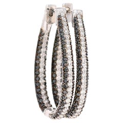 Boucles d
oreilles en or blanc avec diamant noir naturel de 3,27 carats