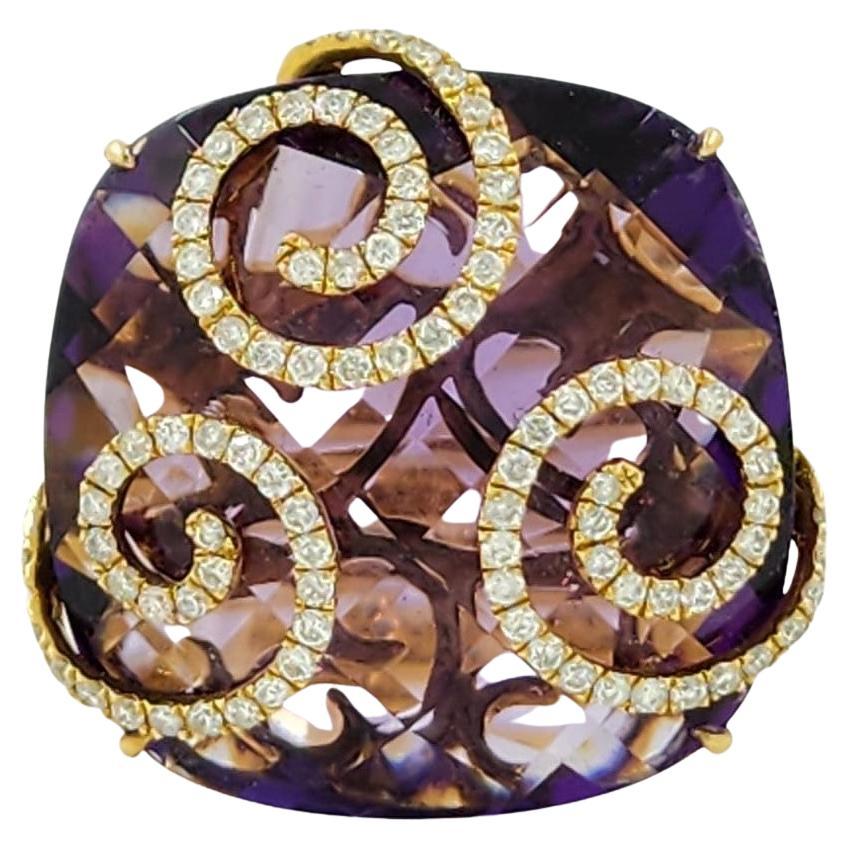 The stunning ring showcases a captivating centerpiece—a faceted cushion amethyst weighing an impressive 32.78 carats. The mesmerizing purple hue of the amethyst is enhanced by the surrounding brilliance of 0.63 carats of white round diamonds. Set in