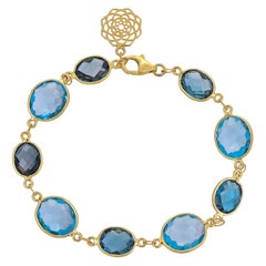 32.78 Carat Blue Topaz 18 Karat Yellow Gold Simple Bracelet