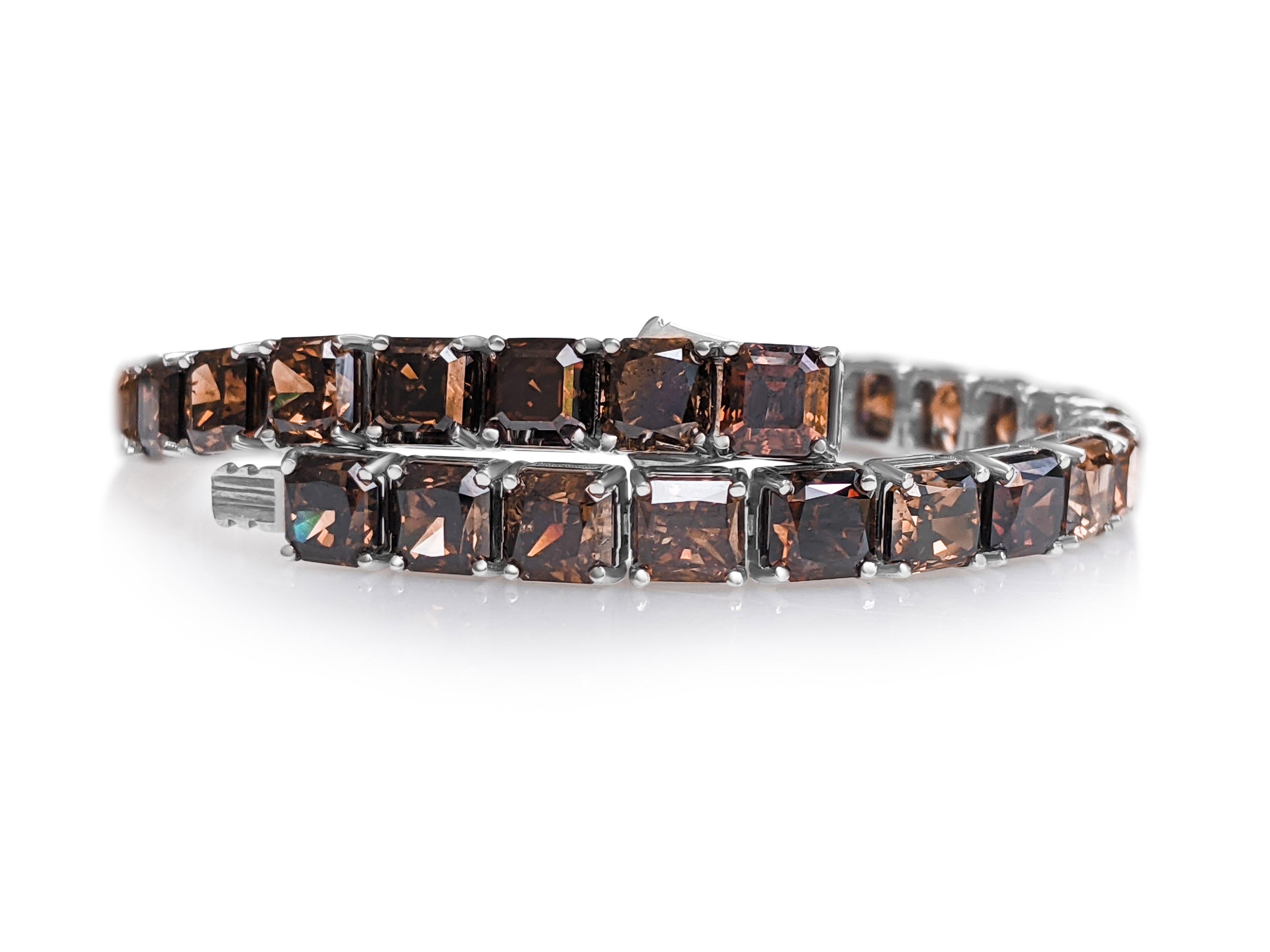 ** In Hong Kong and the USA the VAT is 0%.

A truly unique masterpiece, this fancy color diamond bracelet is made with square cut diamonds of 1ct each!
The diamonds are set in a Riviera style bracelet that will draw attention whenever you go. 
Don't
