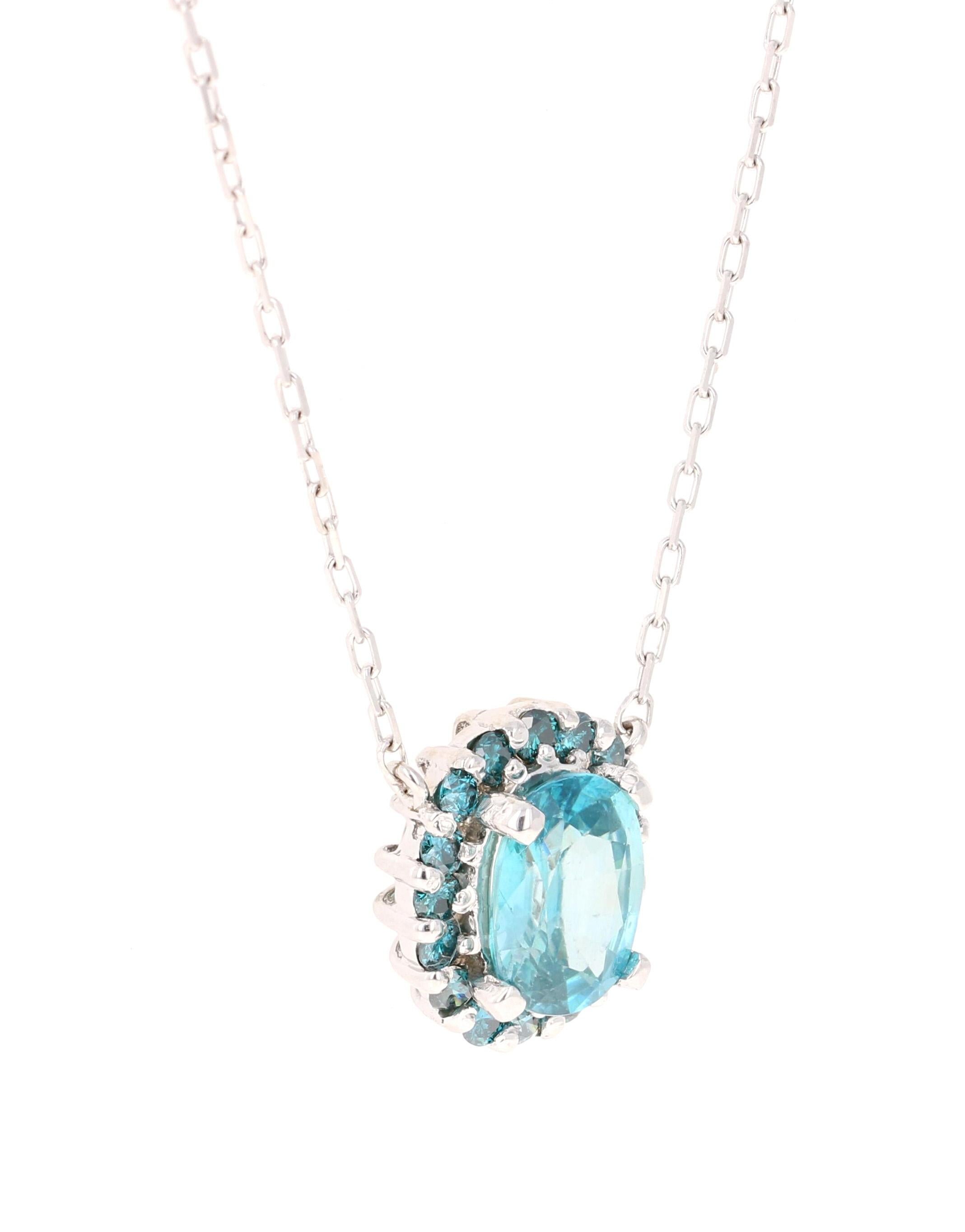 This cute and dainty chain pendant necklace has a 2.80 Carat Blue Zircon and is surrounded by 16 Blue Round Cut Diamonds that weigh 0.48 Carats. 

The chain and setting are made in 14 Karat White Gold and weigh approximately 3.8 grams. 

The chain