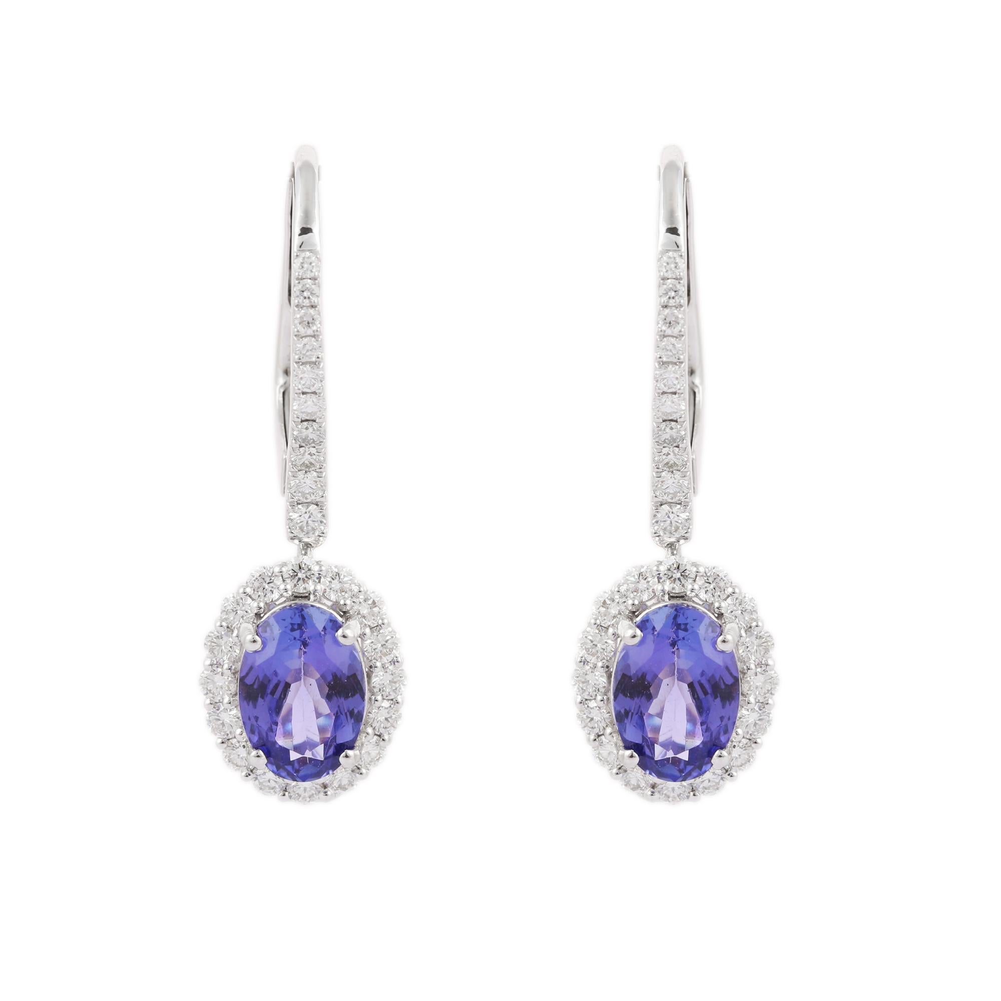 Oval Cut 3.28 Carat Dangle Tanzanite and Diamond Earrings in 18k White Gold For Sale