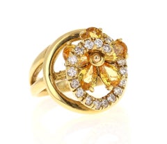 Anillo de cóctel de oro amarillo de 18 quilates con diamante y zafiro amarillo natural de 3,28 quilates