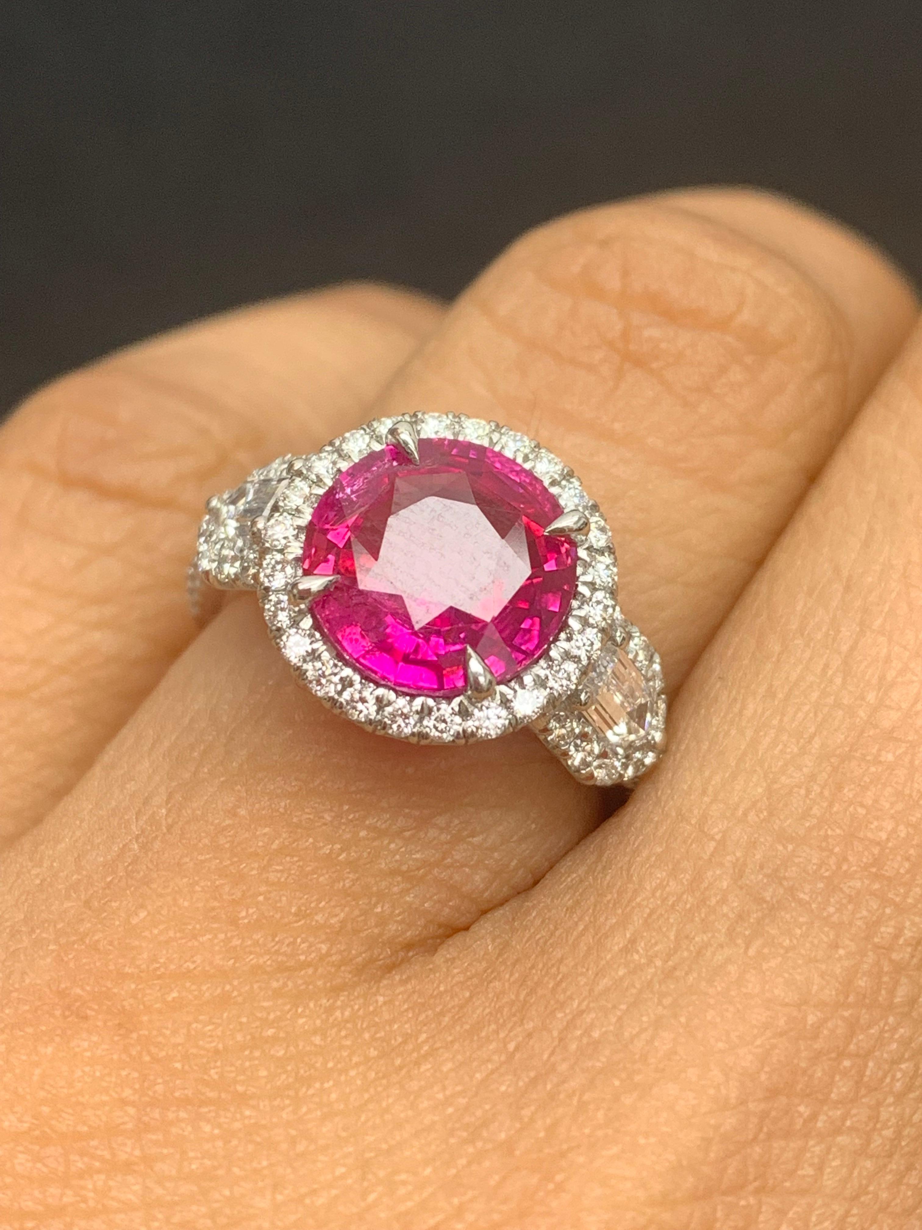 Modern 3.28 Carat Round Cut Ruby and Diamond 3 Stone Halo Ring in Platinum For Sale
