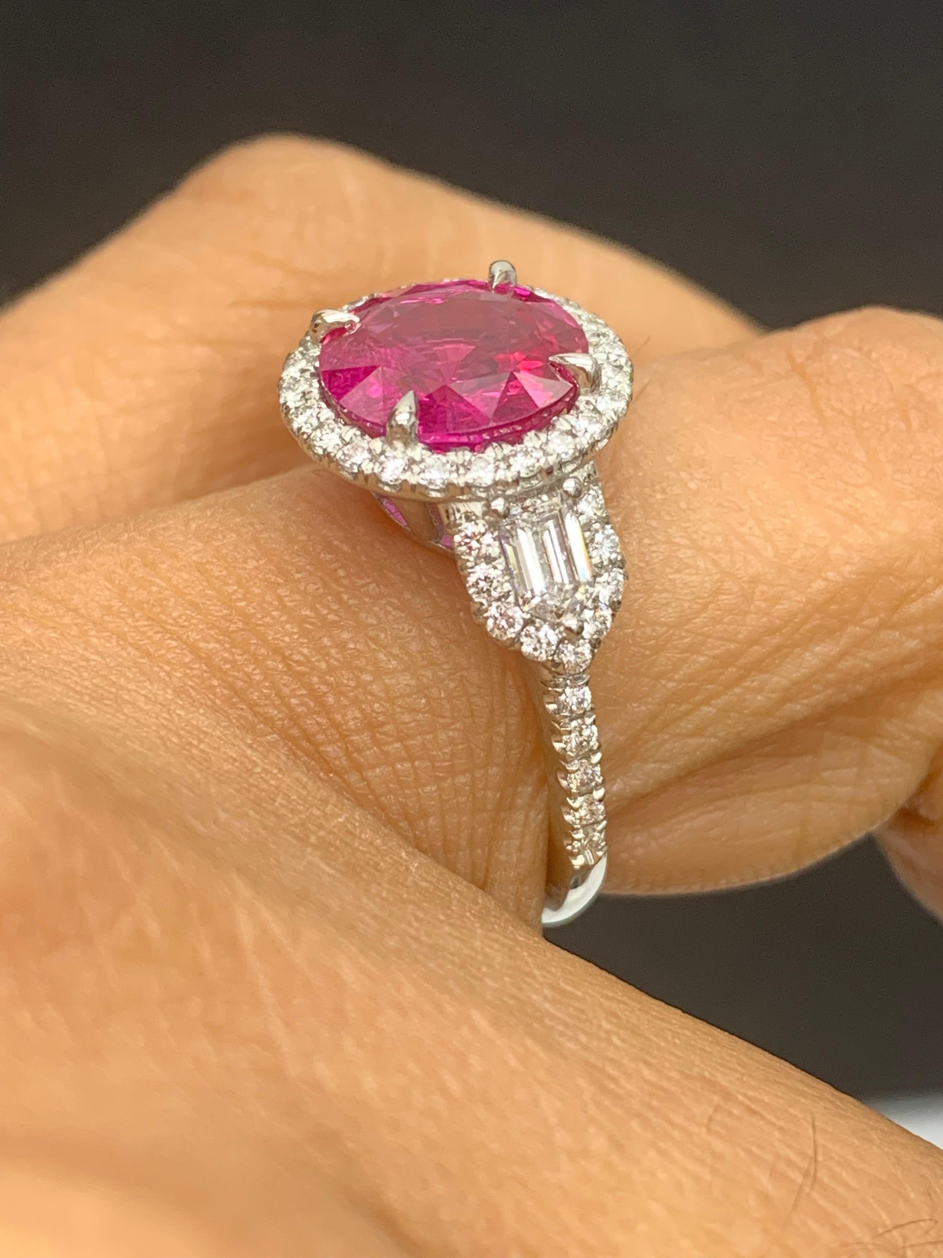 3.28 Carat Round Cut Ruby and Diamond 3 Stone Halo Ring in Platinum In New Condition For Sale In NEW YORK, NY