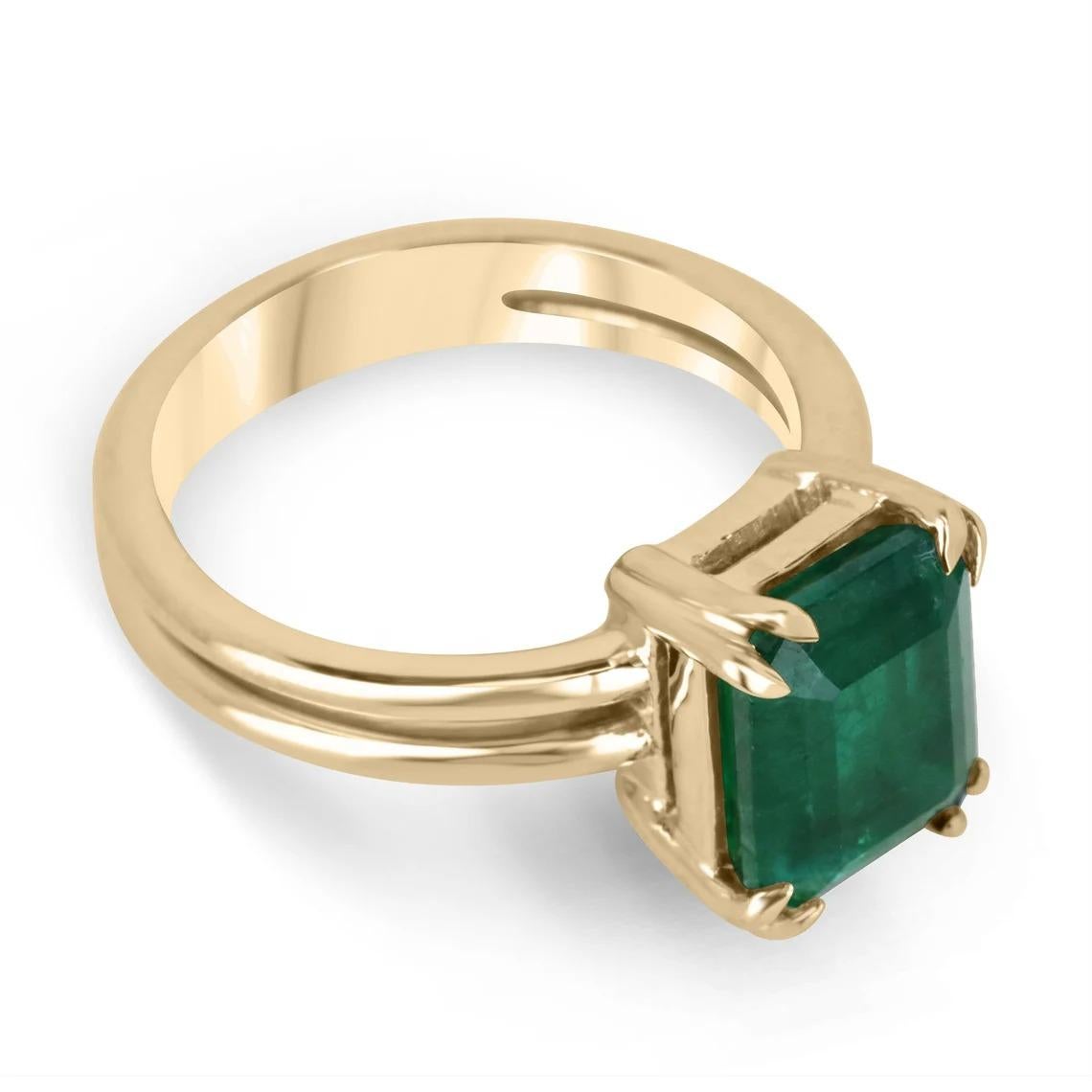 This 3.28-carat natural Zambian emerald is a true statement piece. The deep, dark green color of the stone is absolutely breathtaking and is sure to draw attention. The emerald is set in a simple four-prong setting with double claw prongs, which