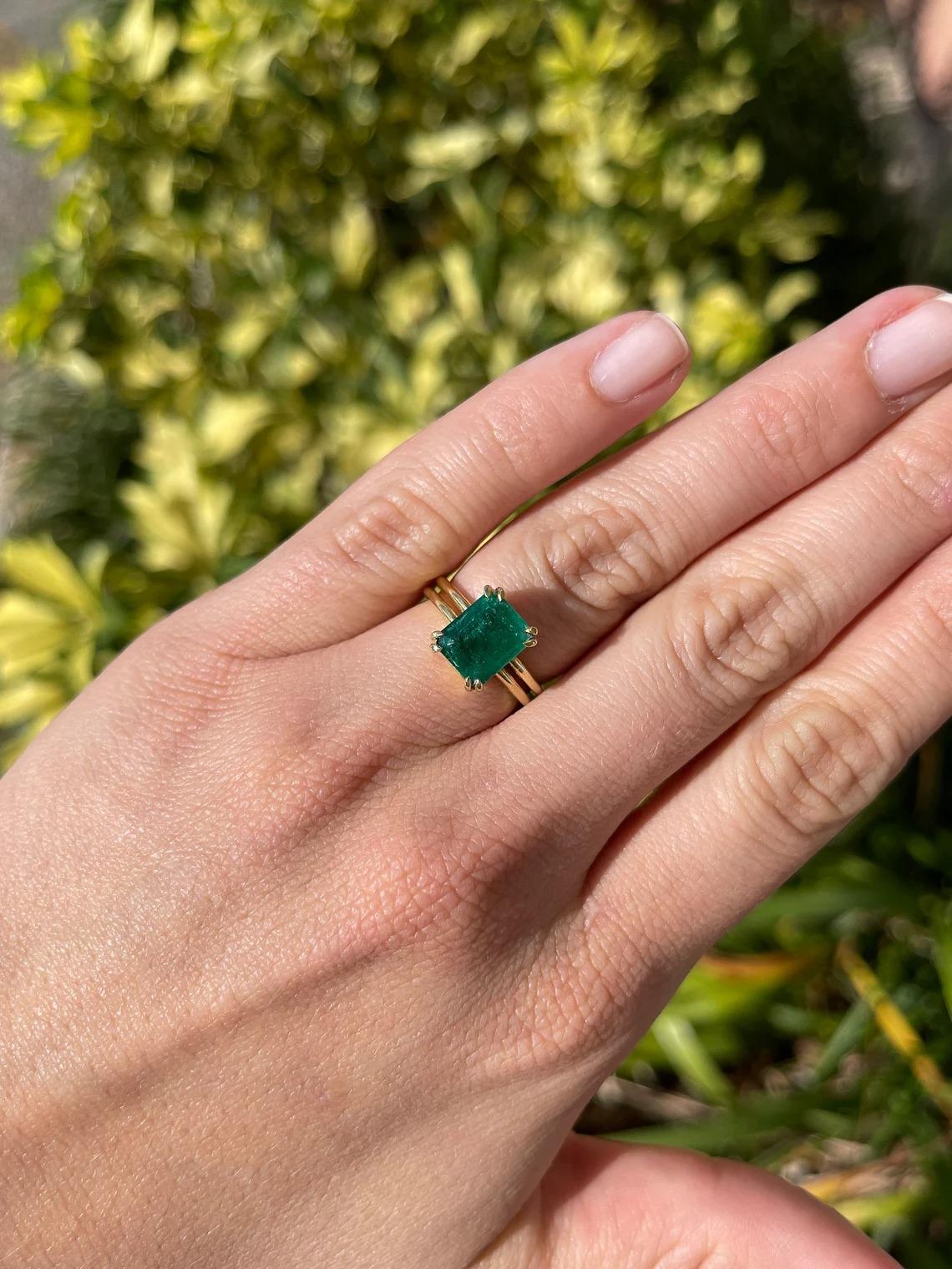 3.28ct 18K Deep Green Emerald Cut Emerald Double Claw Prong Solitaire Gold Ring In New Condition For Sale In Jupiter, FL