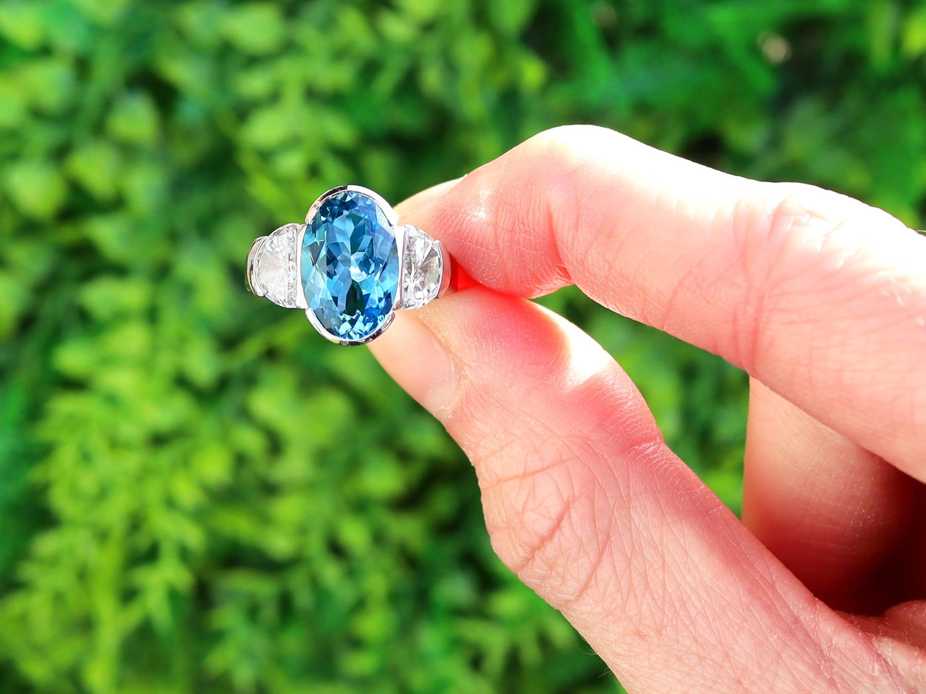 A stunning contemporary 3.28 carat aquamarine and 1.68 carat diamond, 18 karat white gold cocktail ring; part of our diverse aquamarine jewelry collections.

This stunning, fine and impressive contemporary aquamarine ring has been crafted in 18k