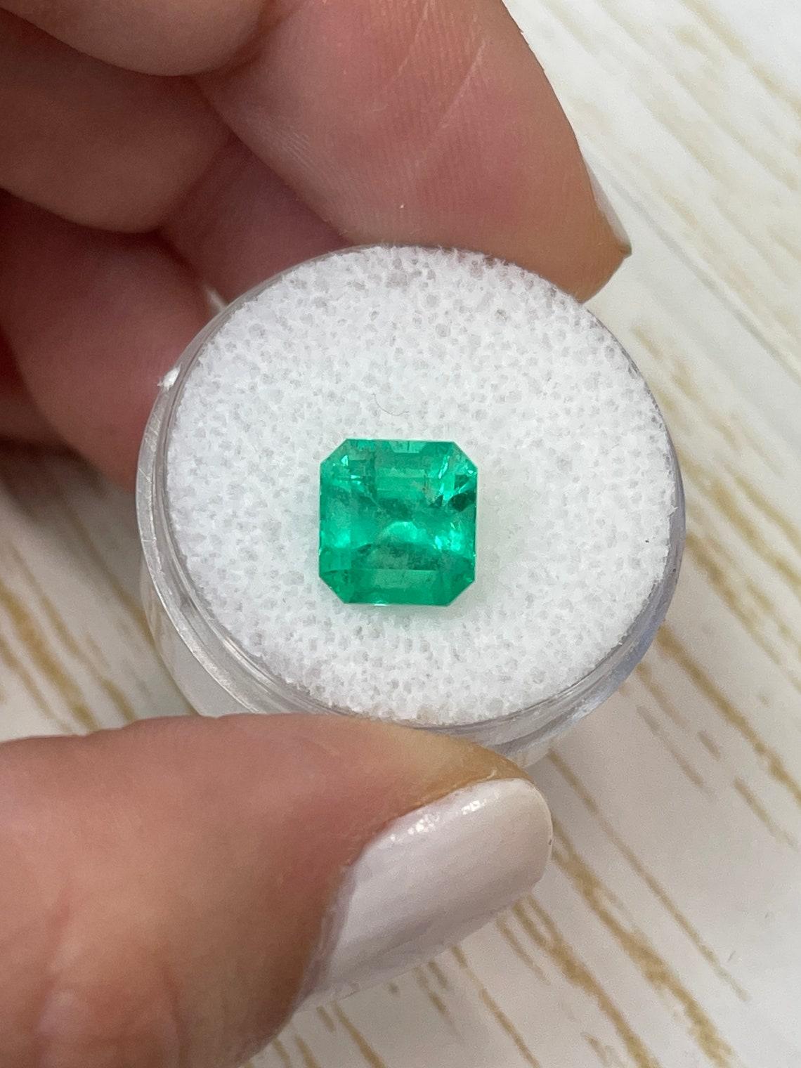 Stone: Emerald
Weight: 3.28-carats
Shape: Asscher Cut
Clarity: Transparent
Luster: Very Good
Color: Medium Yellowish Green
Measurements: 8.64mm x 8.19mm x 6.94mm
Geographic Origin: Colombia
Treatment: Natural, Oiling

Comments: Due to their growth