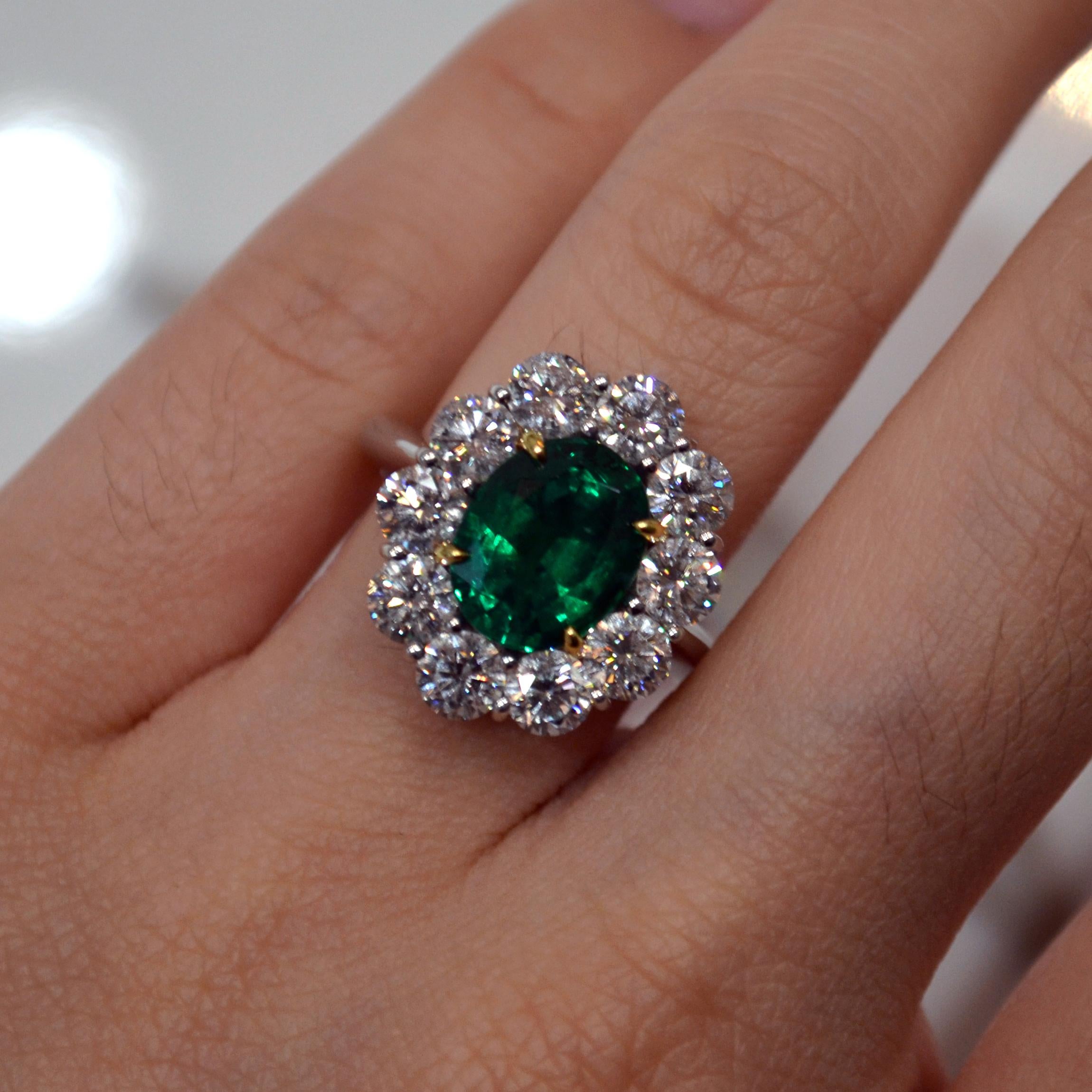 3.29 Carat Emerald Diamond Halo Princess Diana Engagement Ring In Excellent Condition For Sale In New York, NY