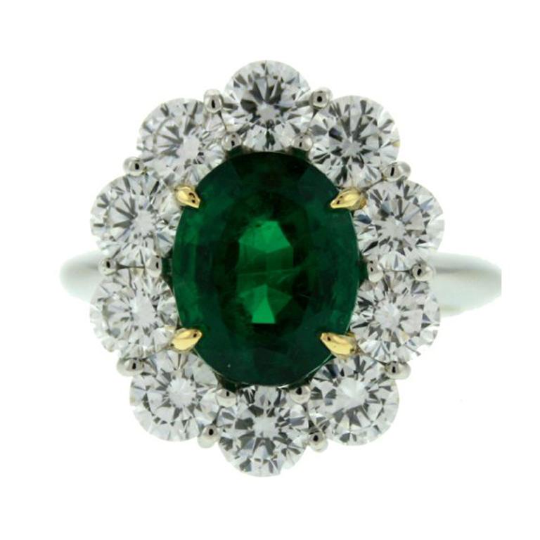 3.29 Carat Emerald Diamond Halo Princess Diana Engagement Ring For Sale