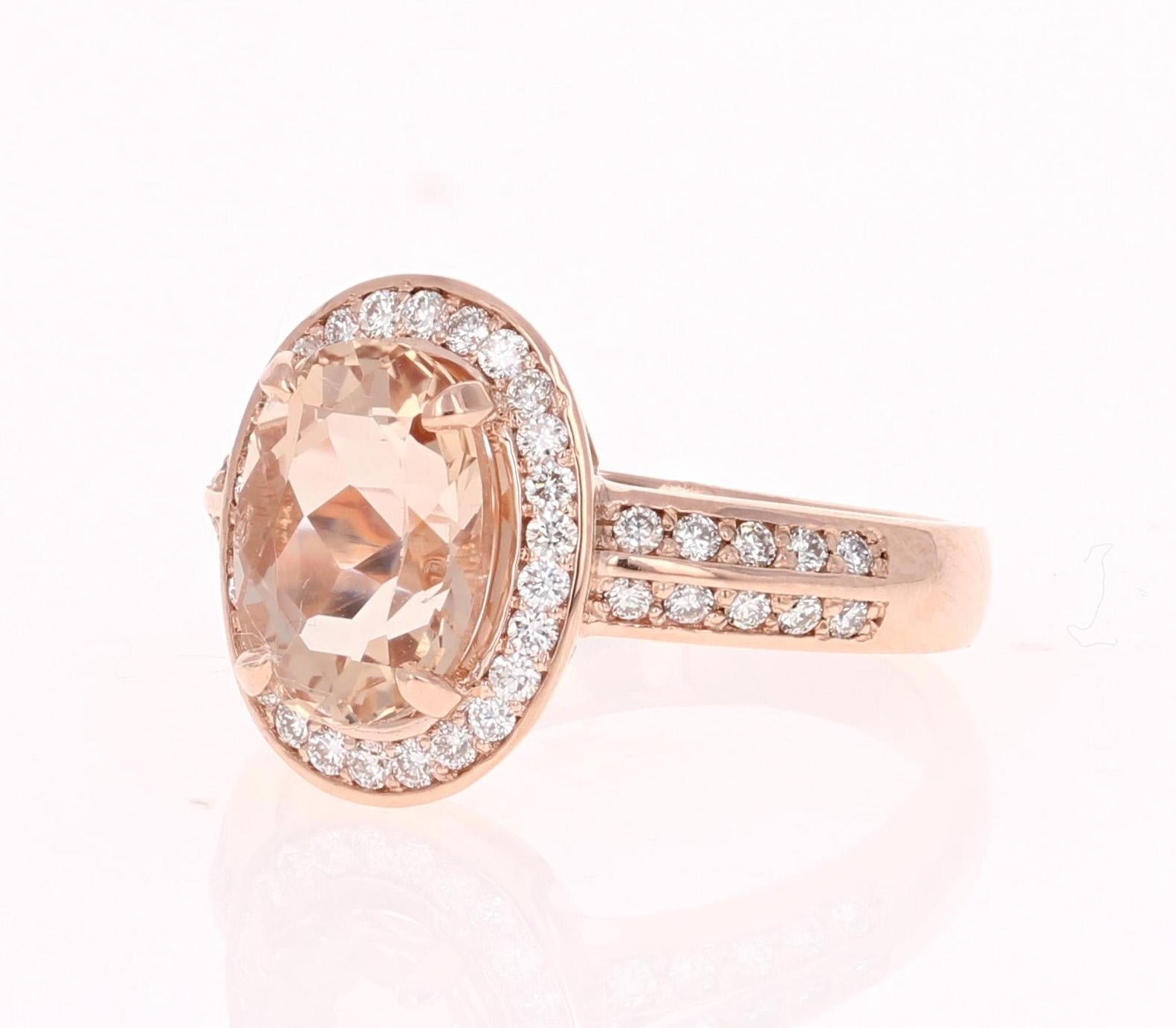 This ring is a 14K Rose Gold Ring which has a 2.81 carat Oval Cut Morganite in the center of the ring.  This ring is surrounded by 46 Round Cut Diamonds that weigh a total of 0.48 carats (Clarity: VS2, Color: H).  The total carat weight of the ring
